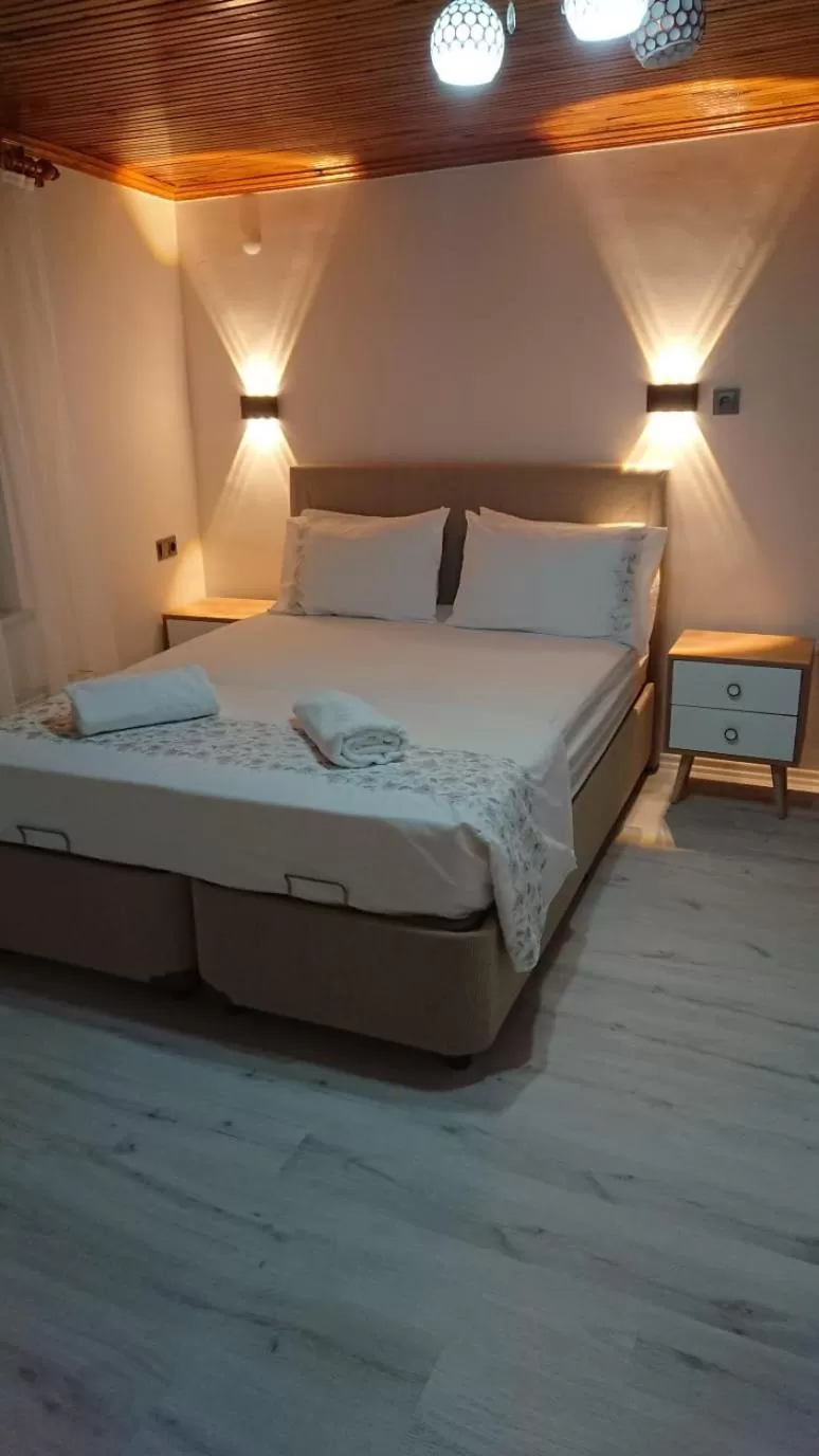 Bed in Ali's Pension