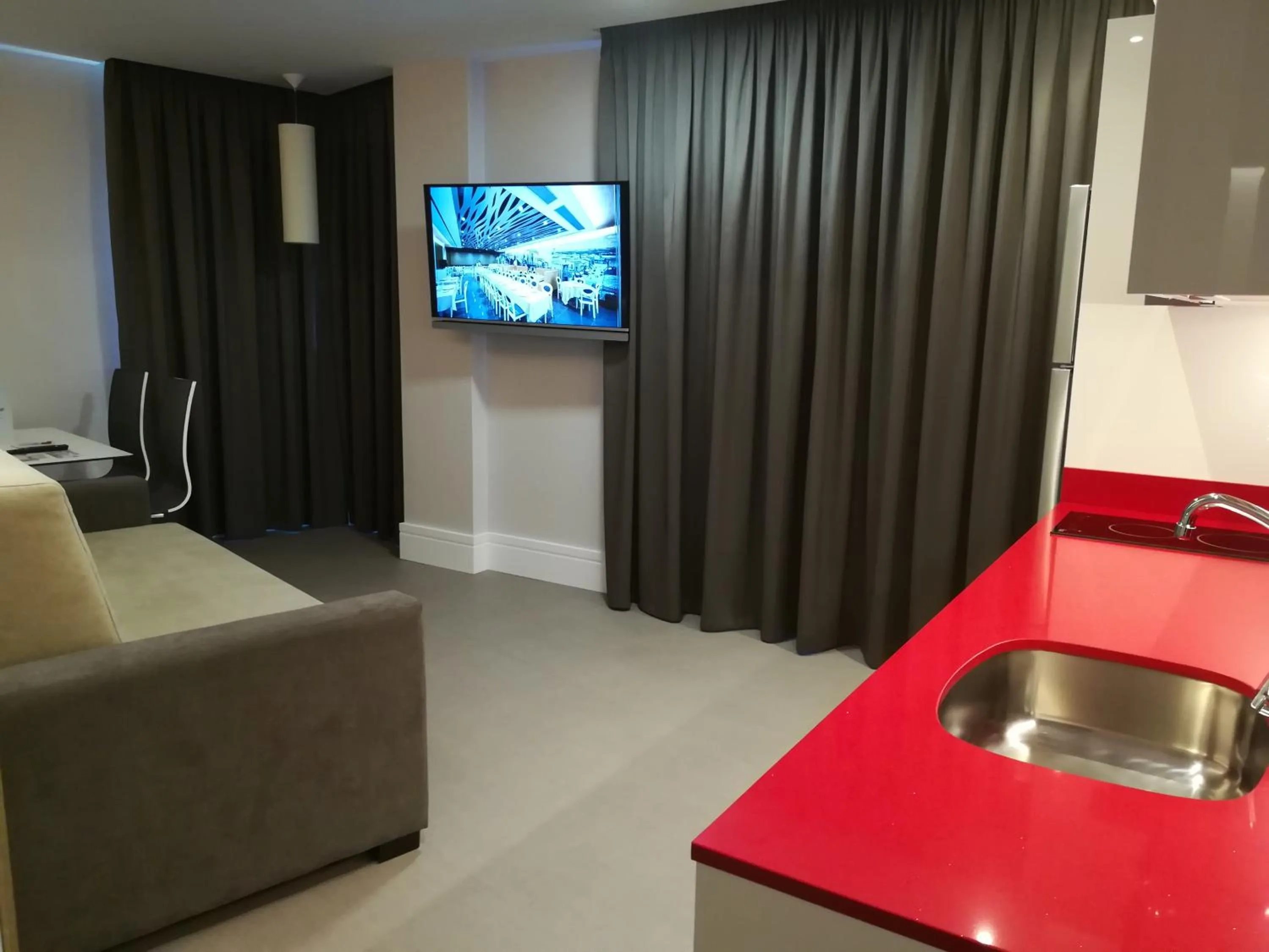 TV and multimedia in Hotel & Spa Ciudad de Binéfar