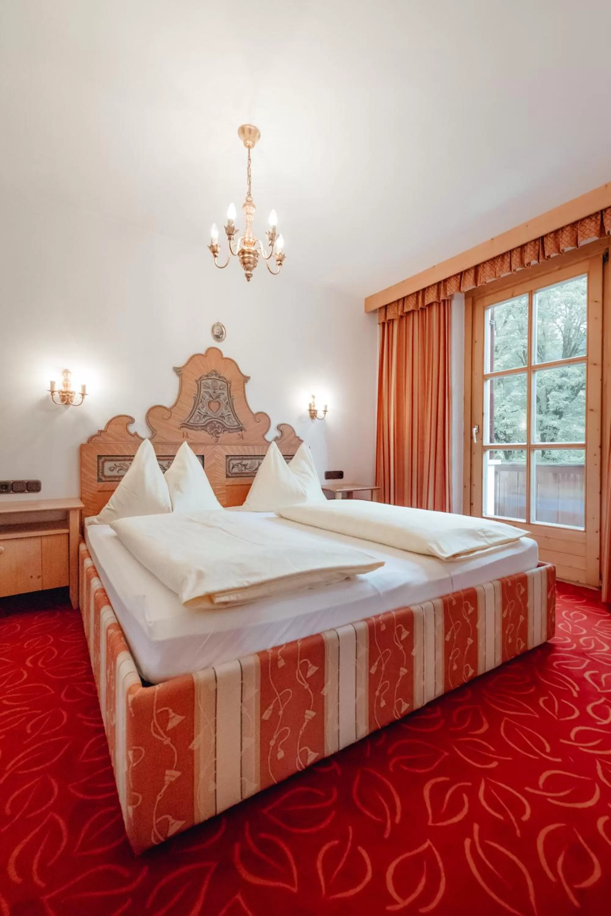 Bed in Dandler - Zimmer und Ferienwohnungen