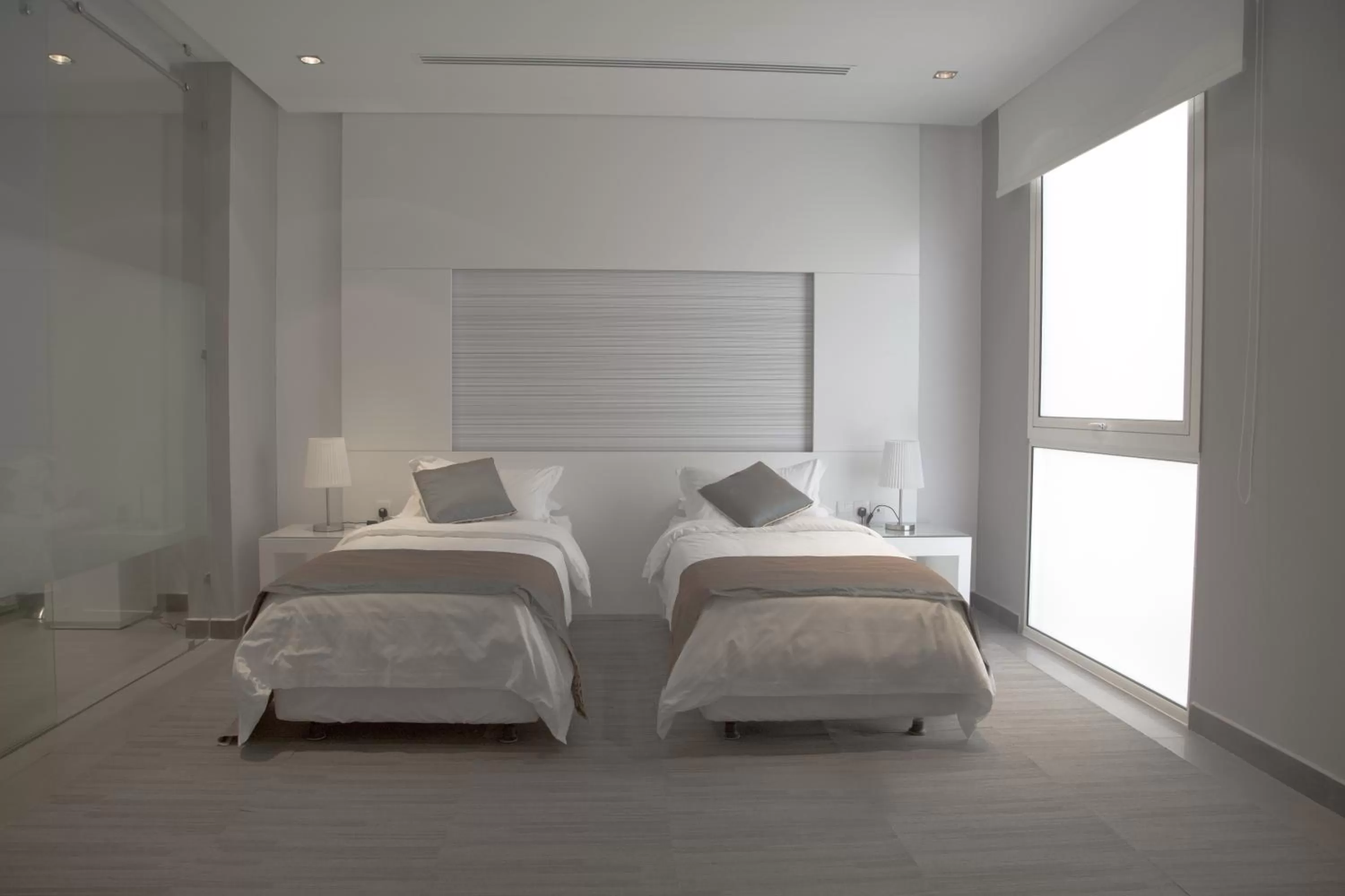 Bed in Rafa Hotel Apart