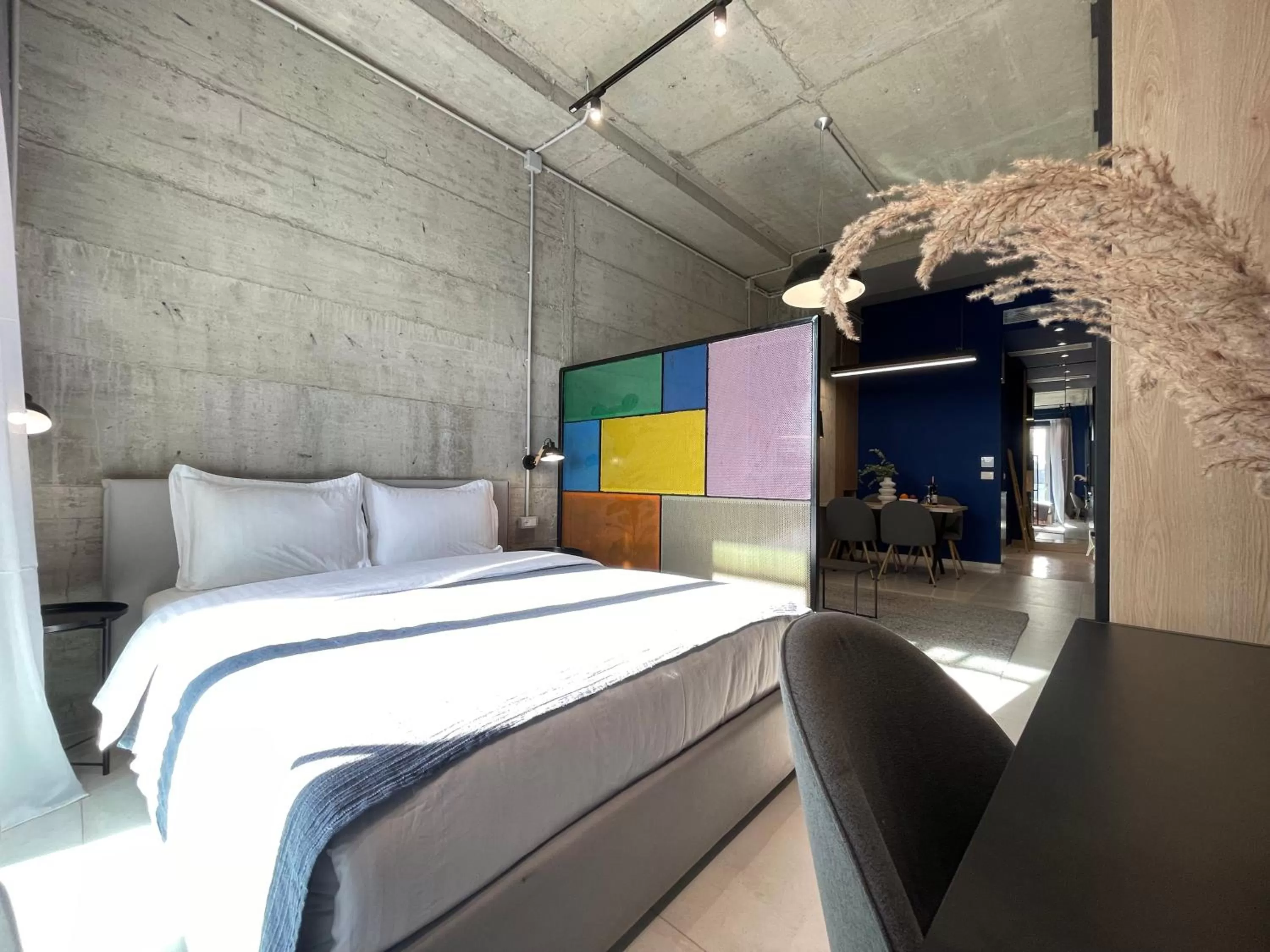 Bed in Ambassador Skyline Apartments