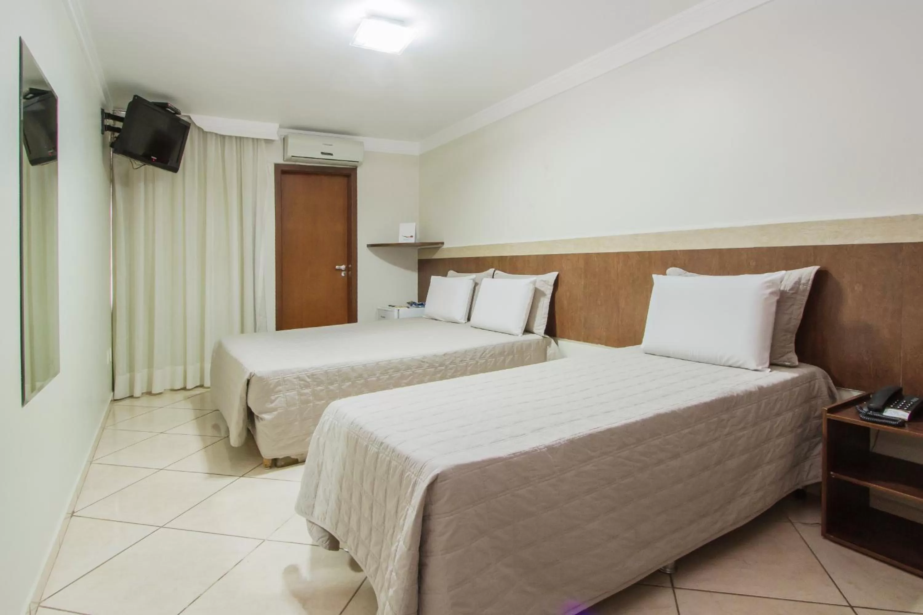 Bed in Alfa Plaza Hotel