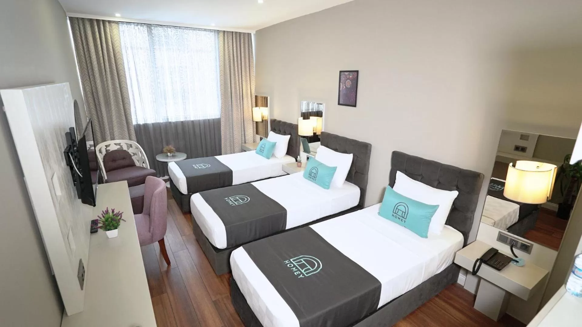 Bed in Homey AirPort Hotel