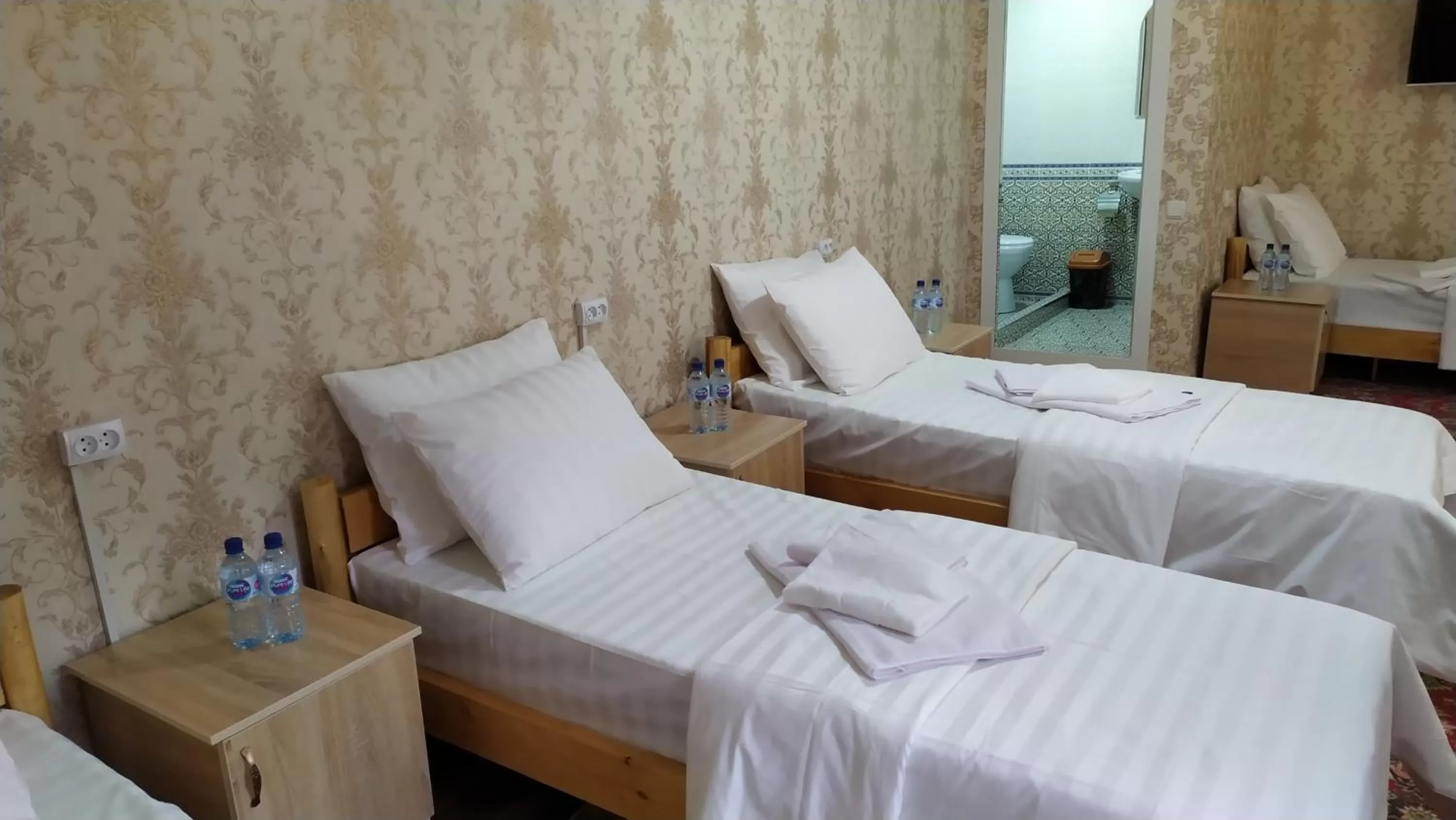 Bed in Alisher B&B Chorbog'