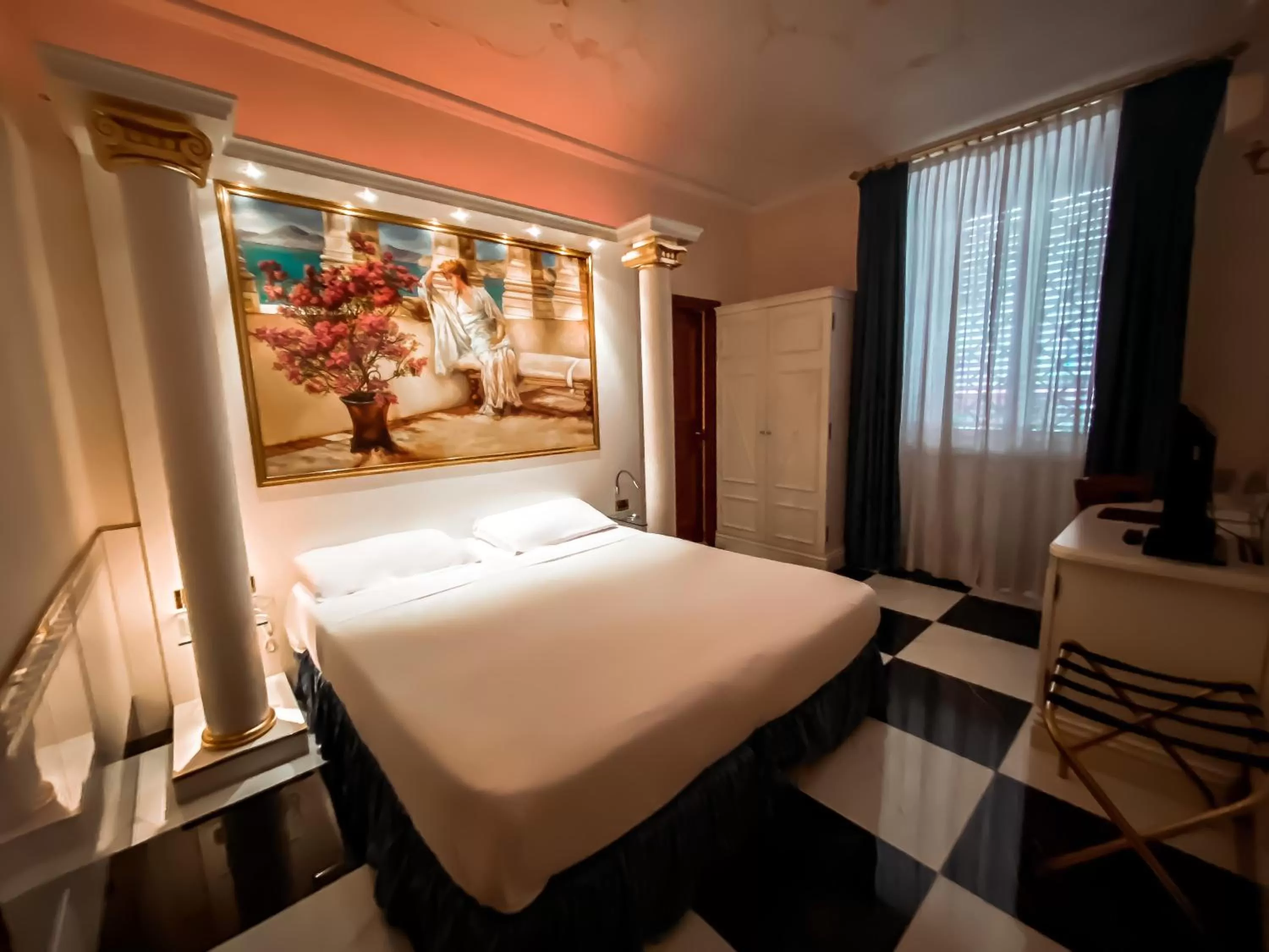 Bed in Hotel Palladium Palace