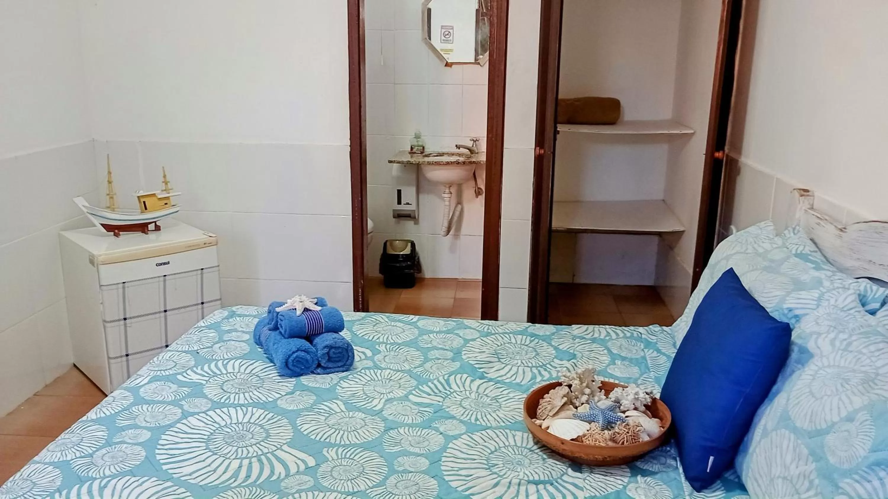 Bed in Hibiscos Pousada