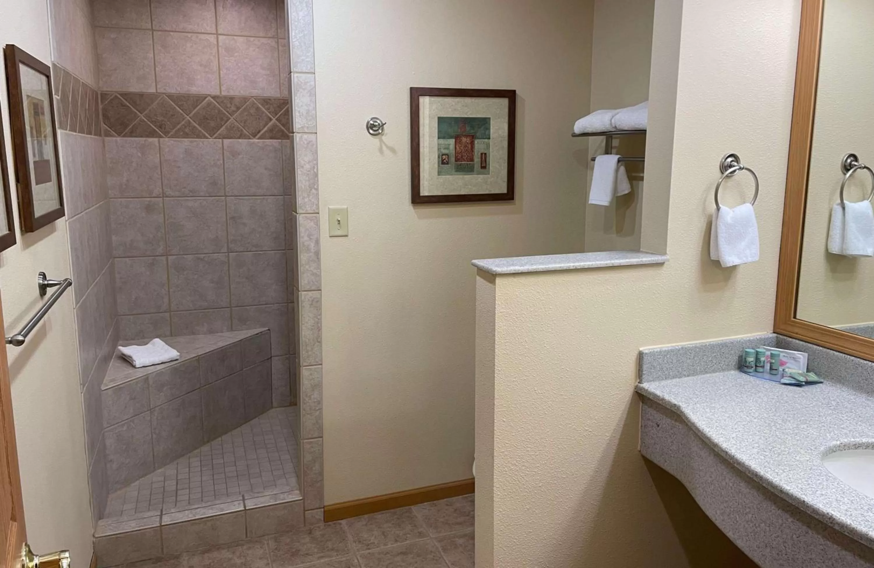 Bathroom in Crossroads Hotel & Event Center