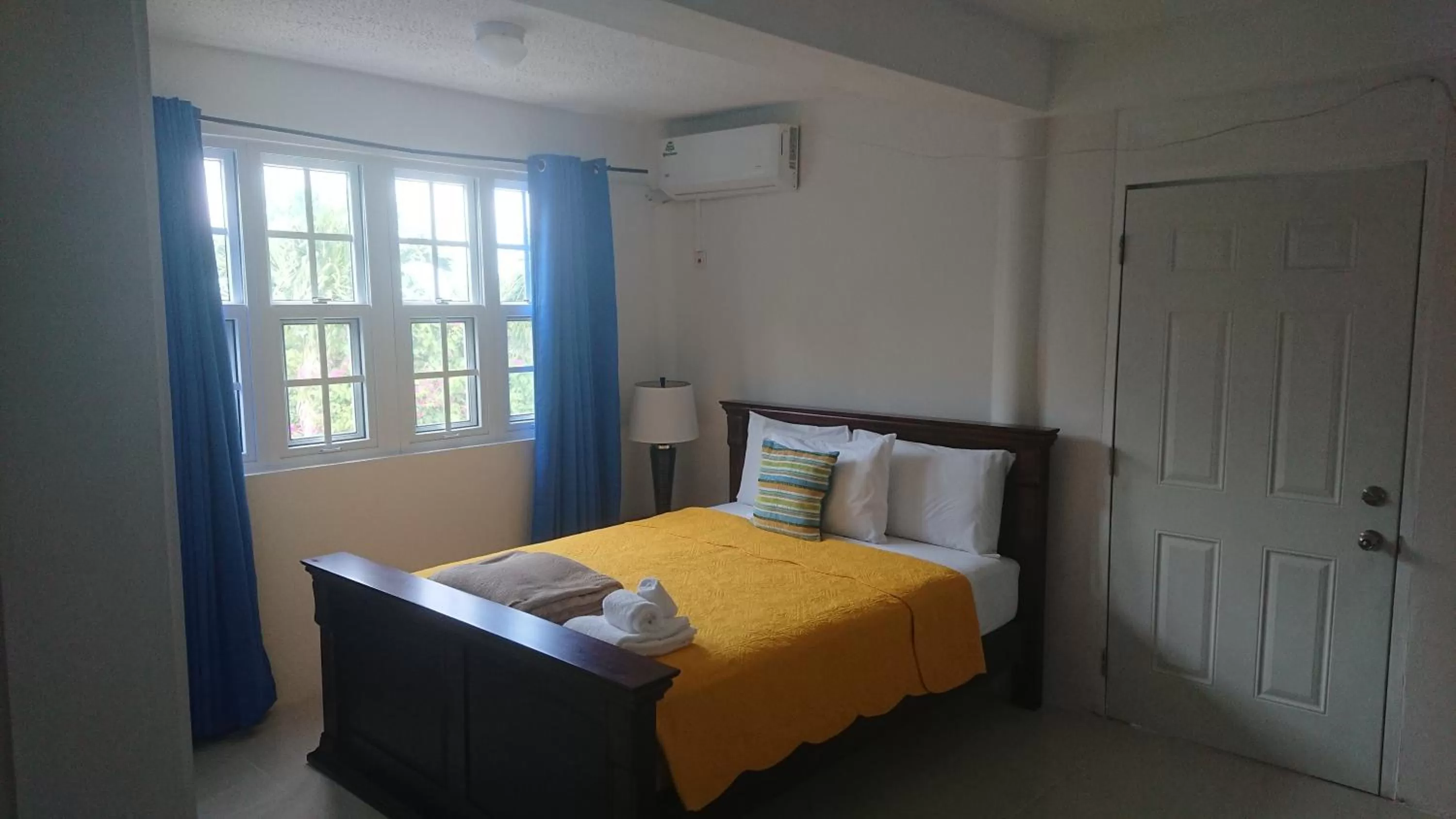 Bed in Classique International in Dominica