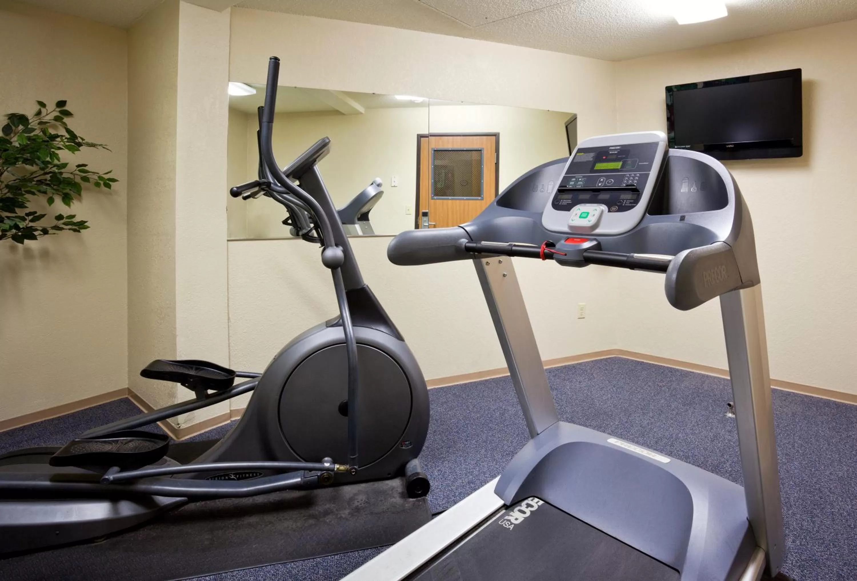 Fitness centre/facilities in AmericInn by Wyndham Fargo West Acres