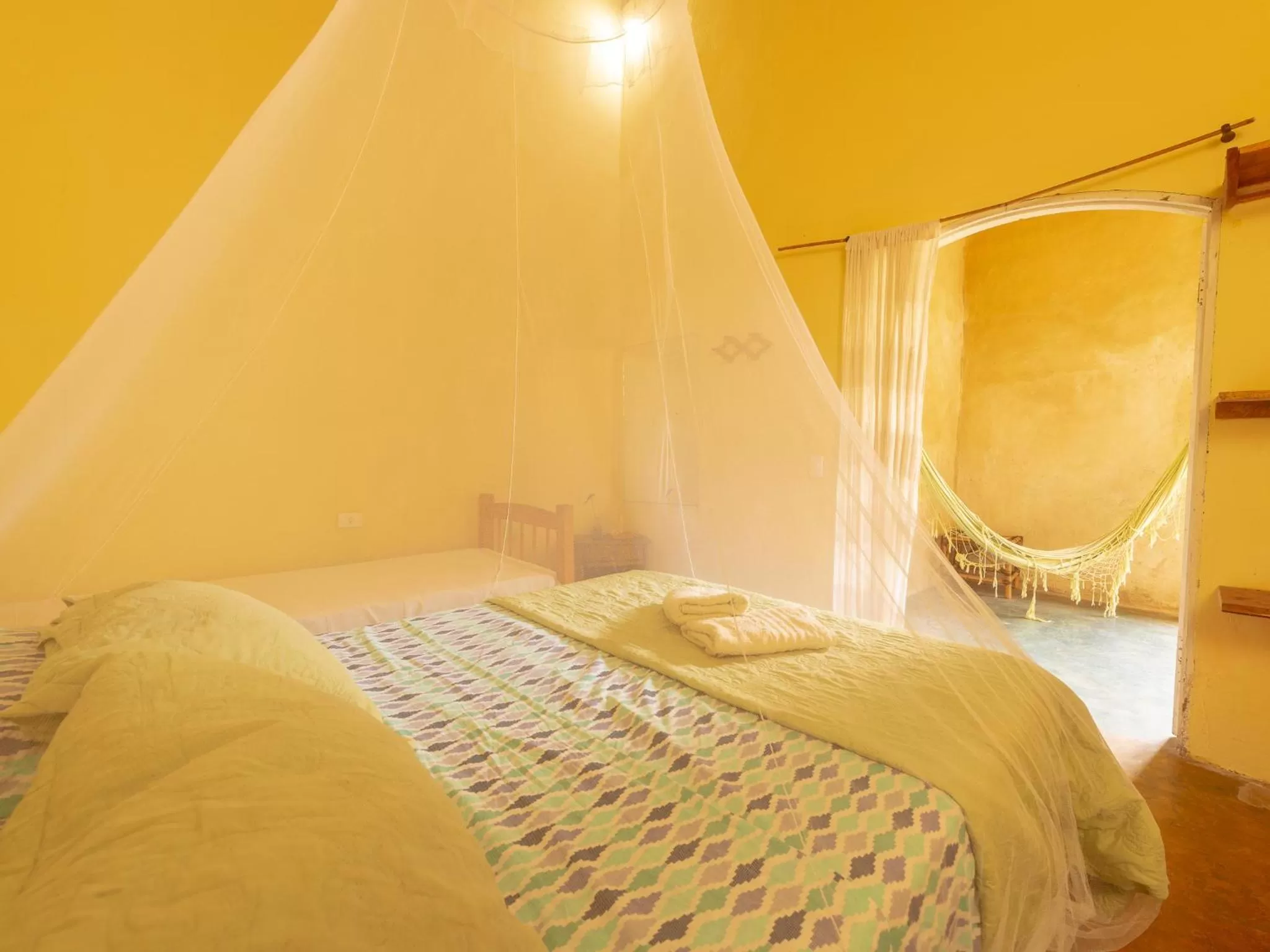 Bed in Pousada da Rosa