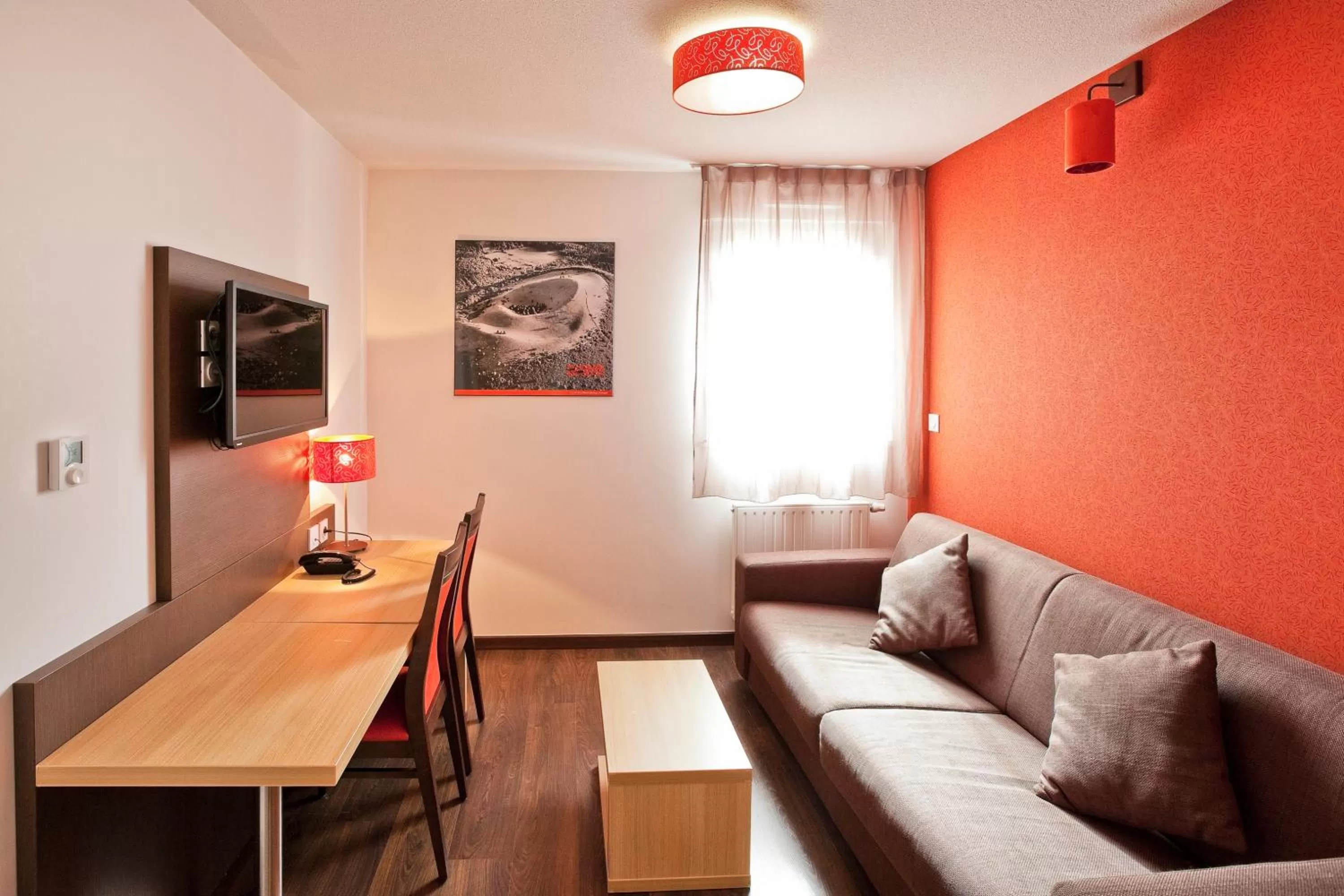 Living room in Apparthotel Privilodges Carré de Jaude