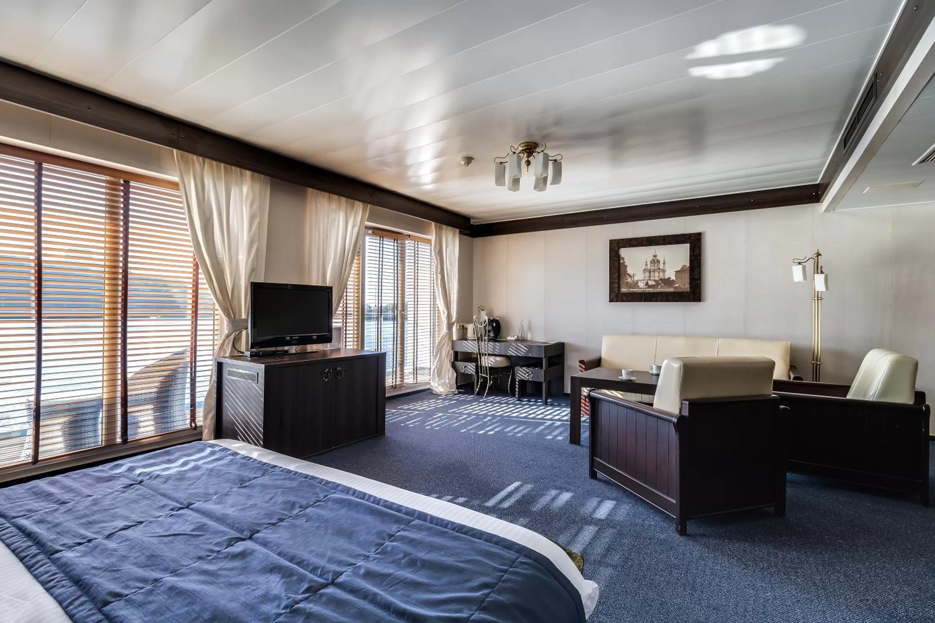 Bed, Seating Area in Bakkara Hotel