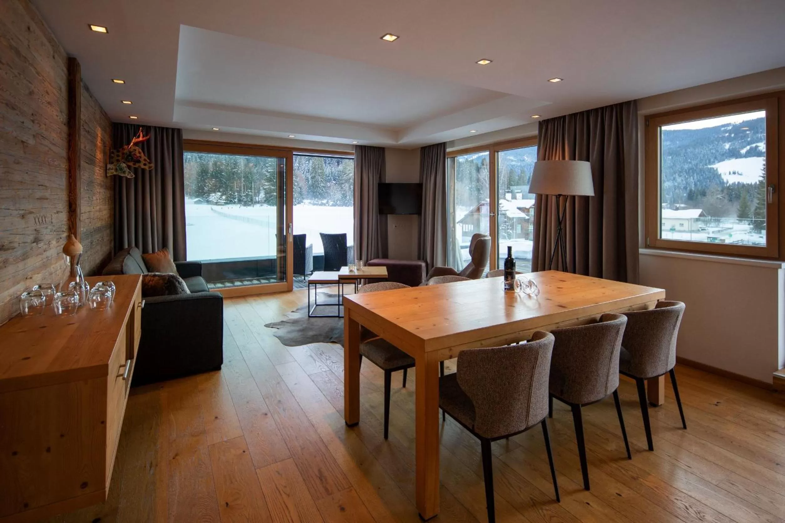 Living room in Berg & Golf Resort Westendorf by ALPS RESORTS