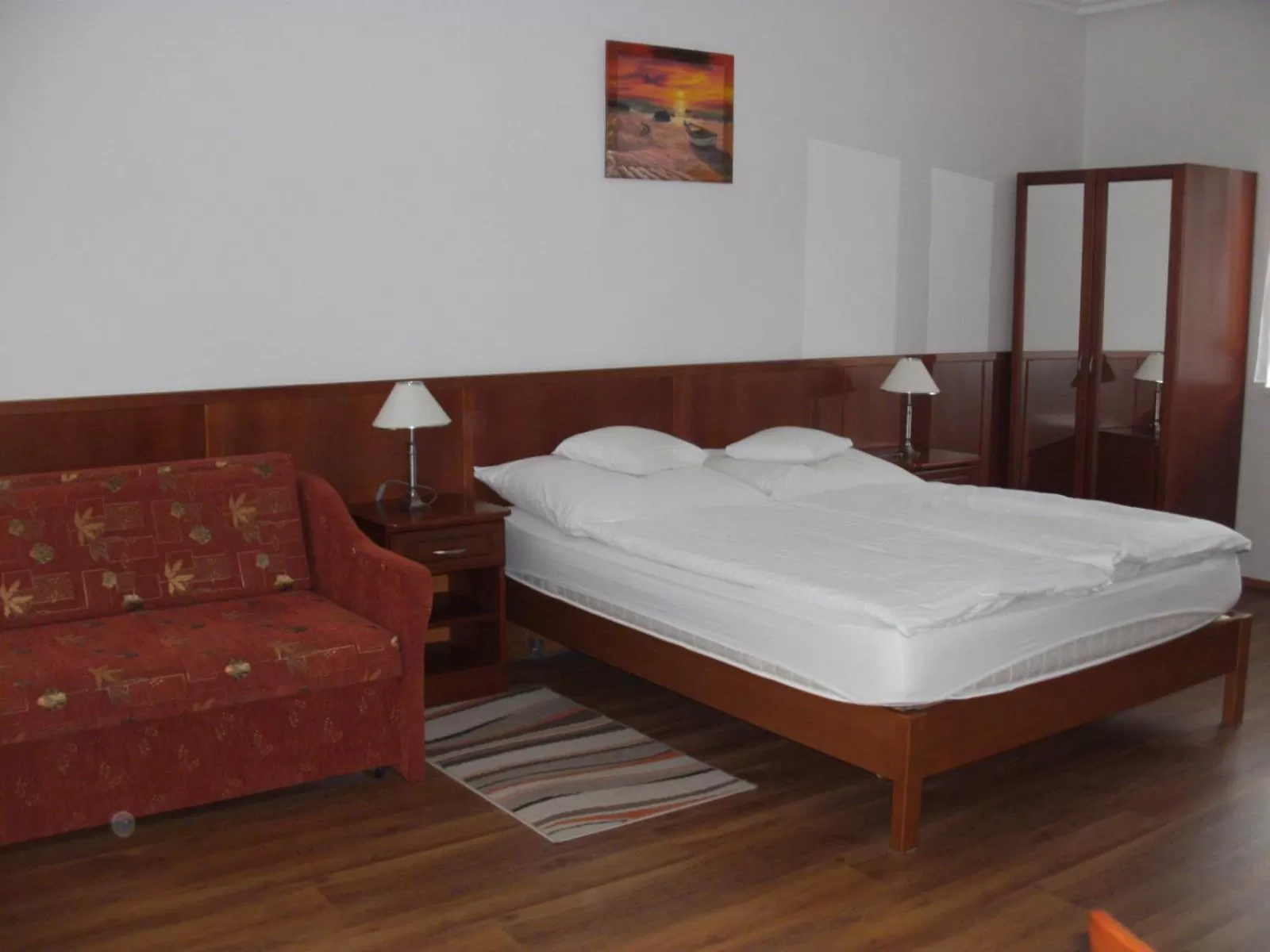 Bed in Szieszta Panzió