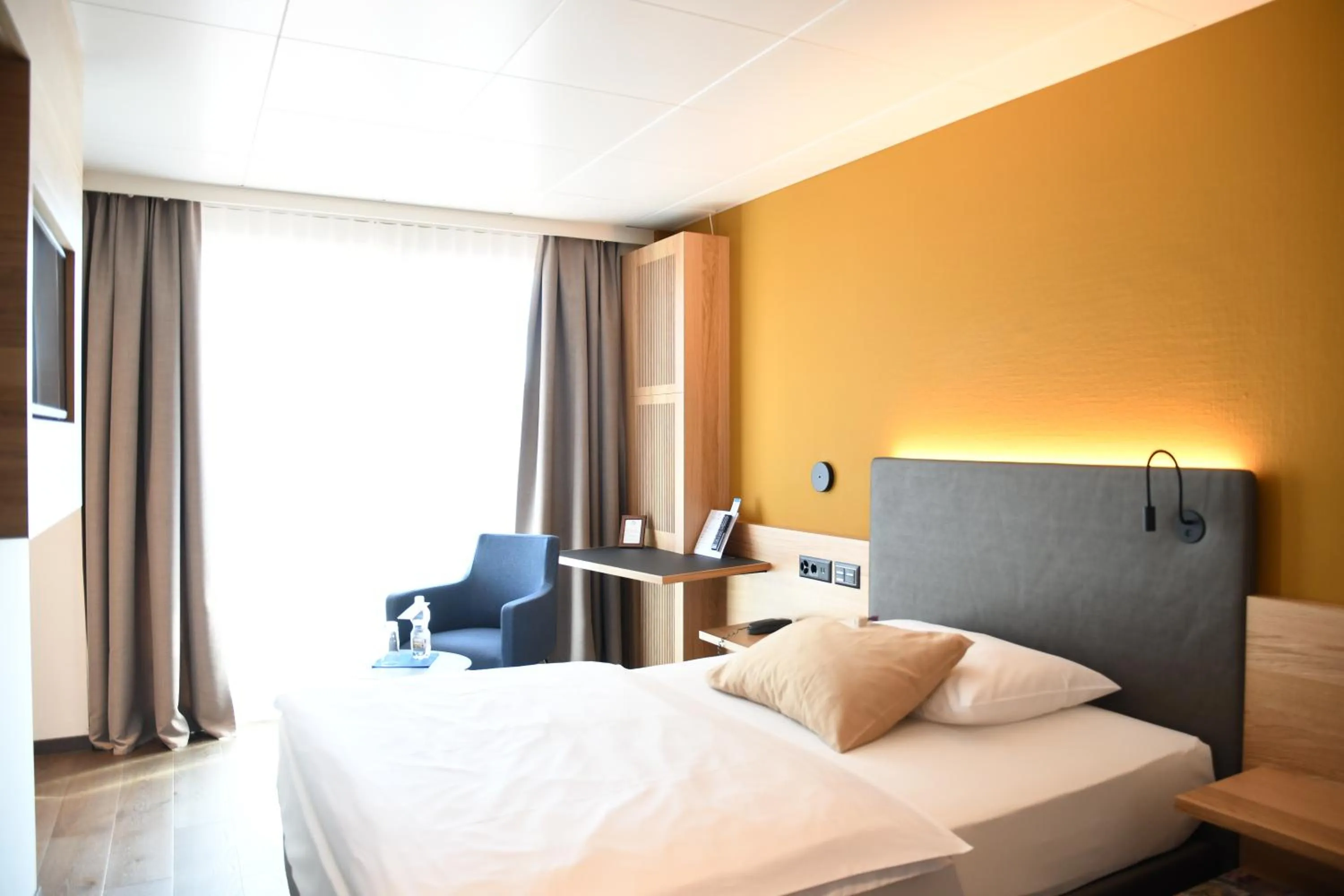 Bed in Engimatt City & Garden Hotel