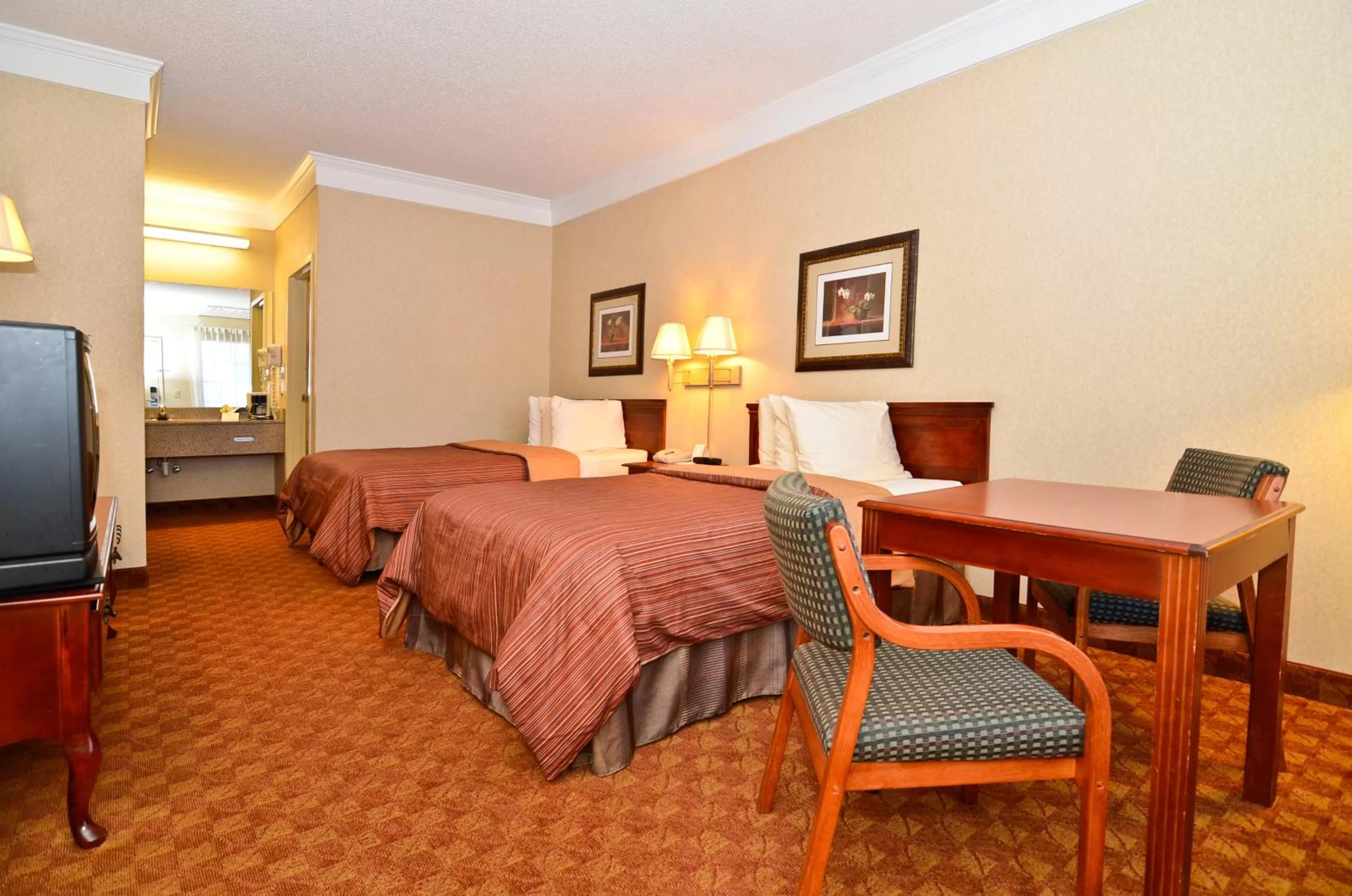 Photo of the whole room, Bed in Peach State Inn & Suites