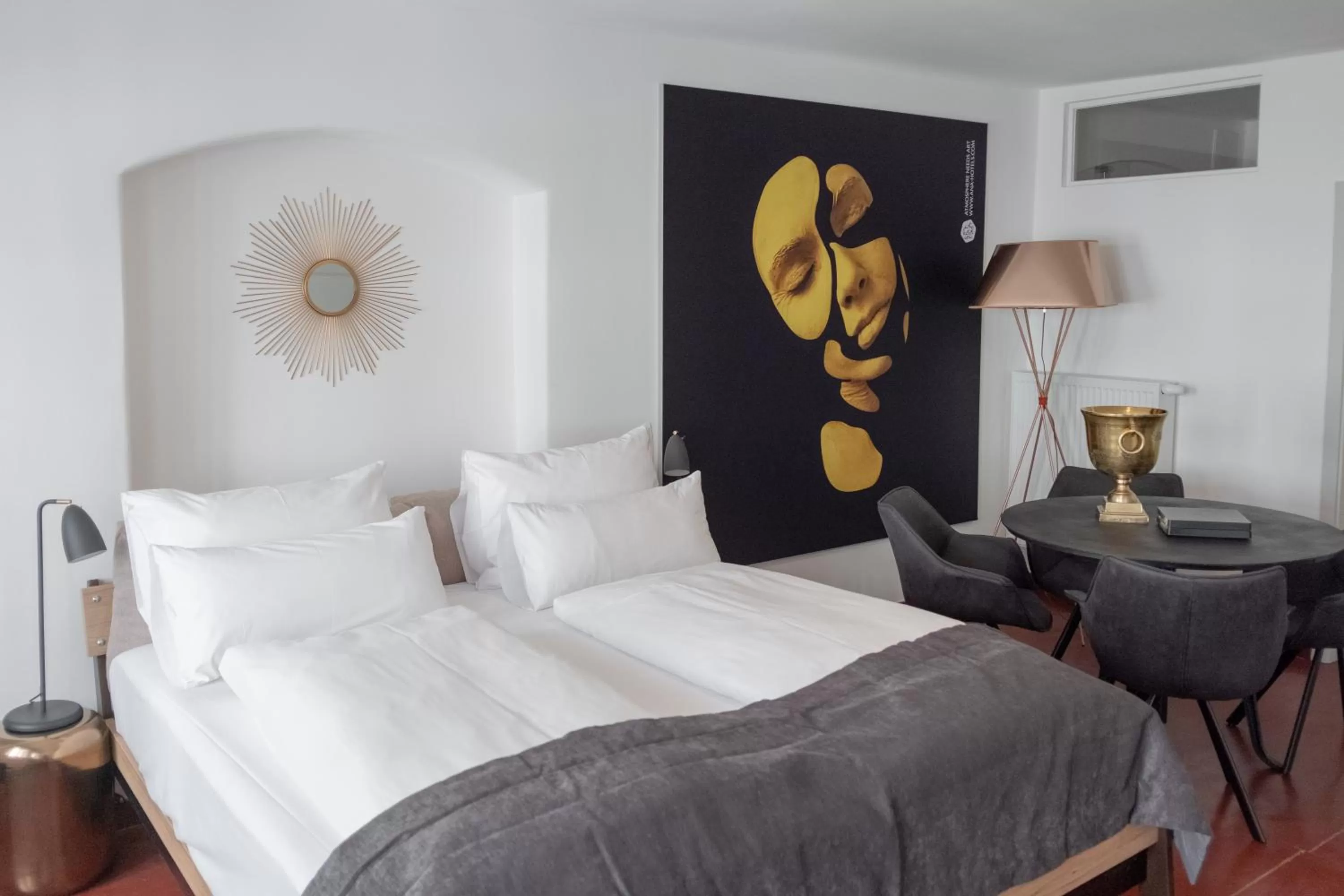 Bed in ANA Living Augsburg City Center by Arthotel ANA - Self-Service-Hotel