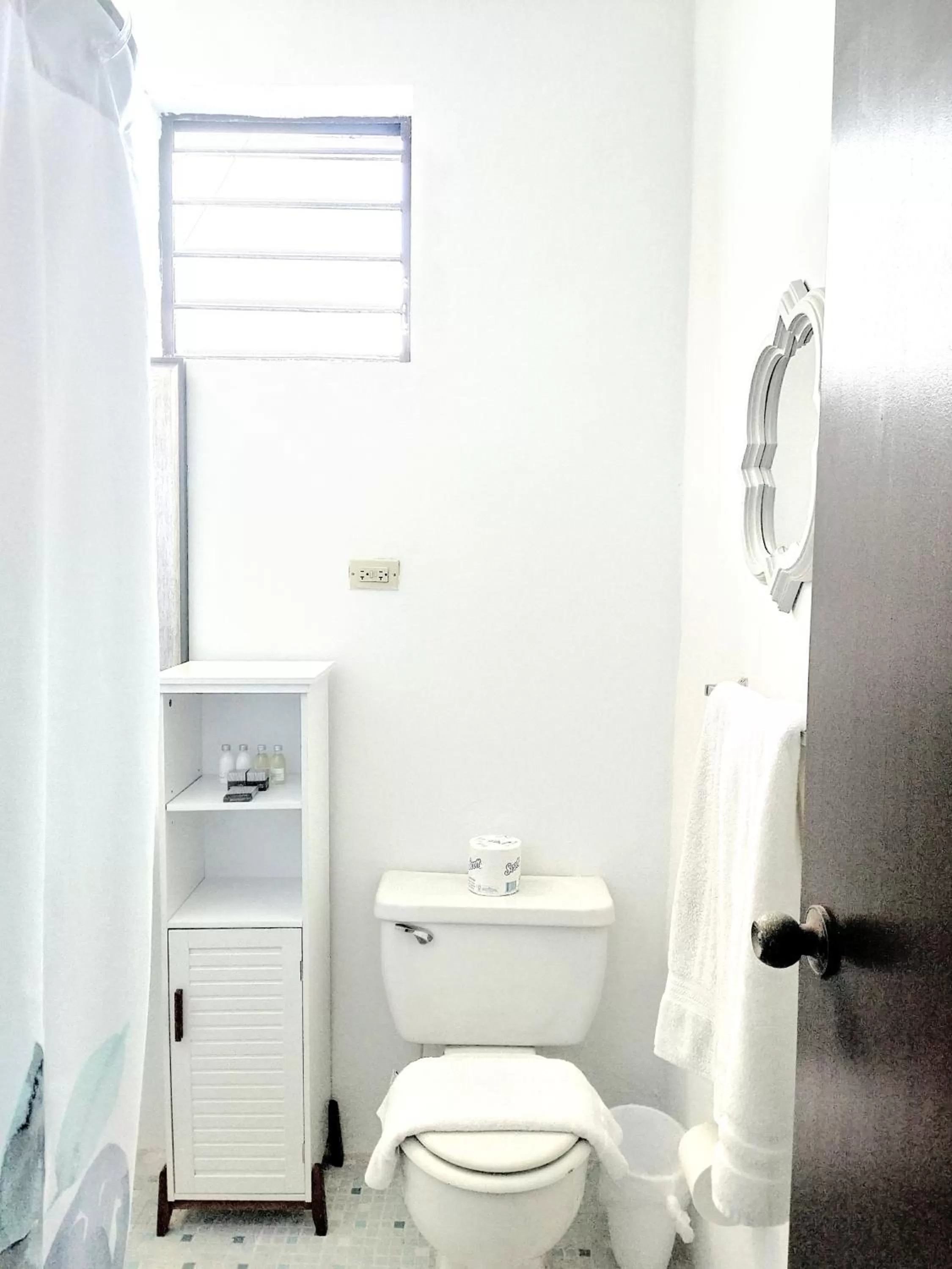 Bathroom in La Capitana Old San Juan Building