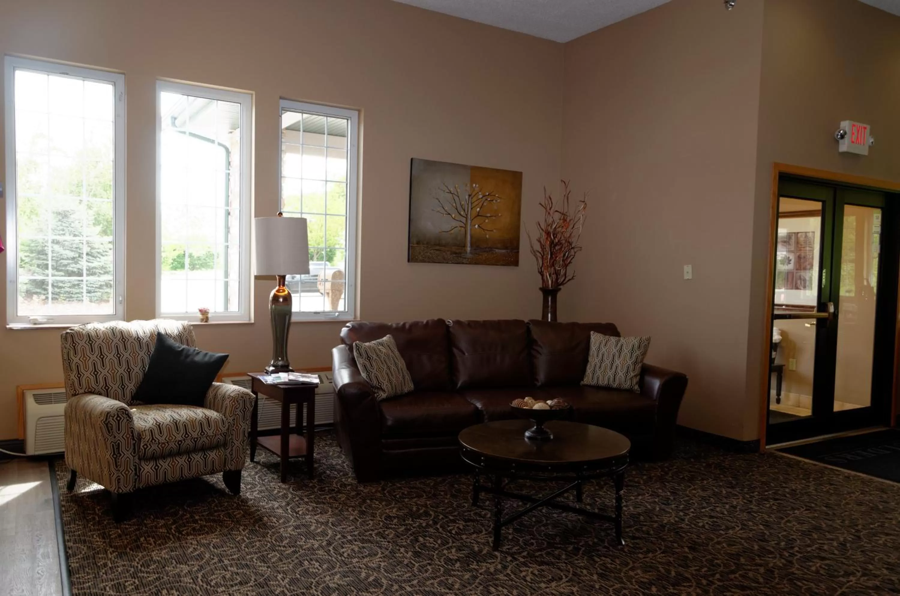 Lobby or reception in Cobblestone Inn & Suites - Denison | Majestic Hills