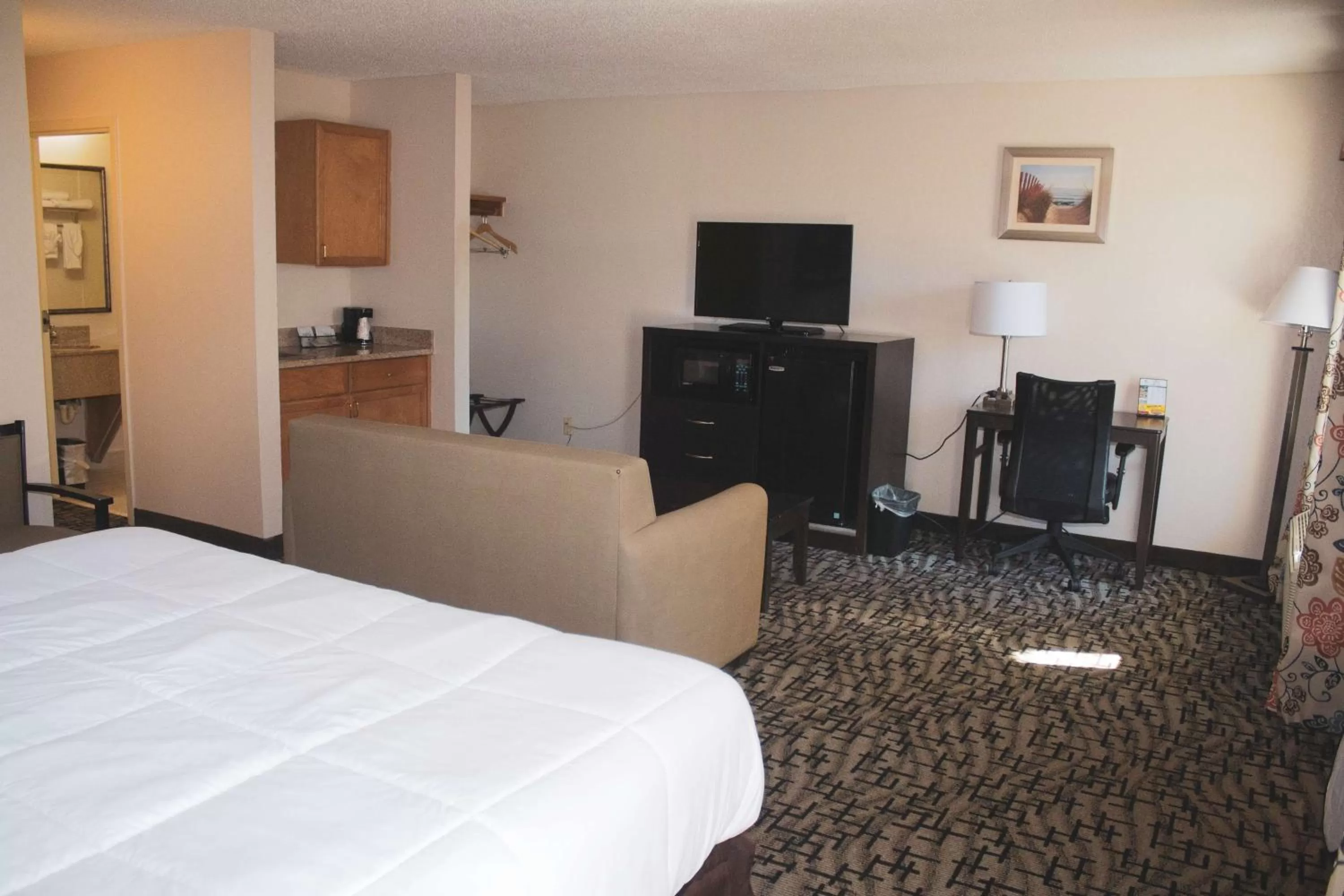 Photo of the whole room, Bed in SureStay Hotel by Best Western North Myrtle Beach