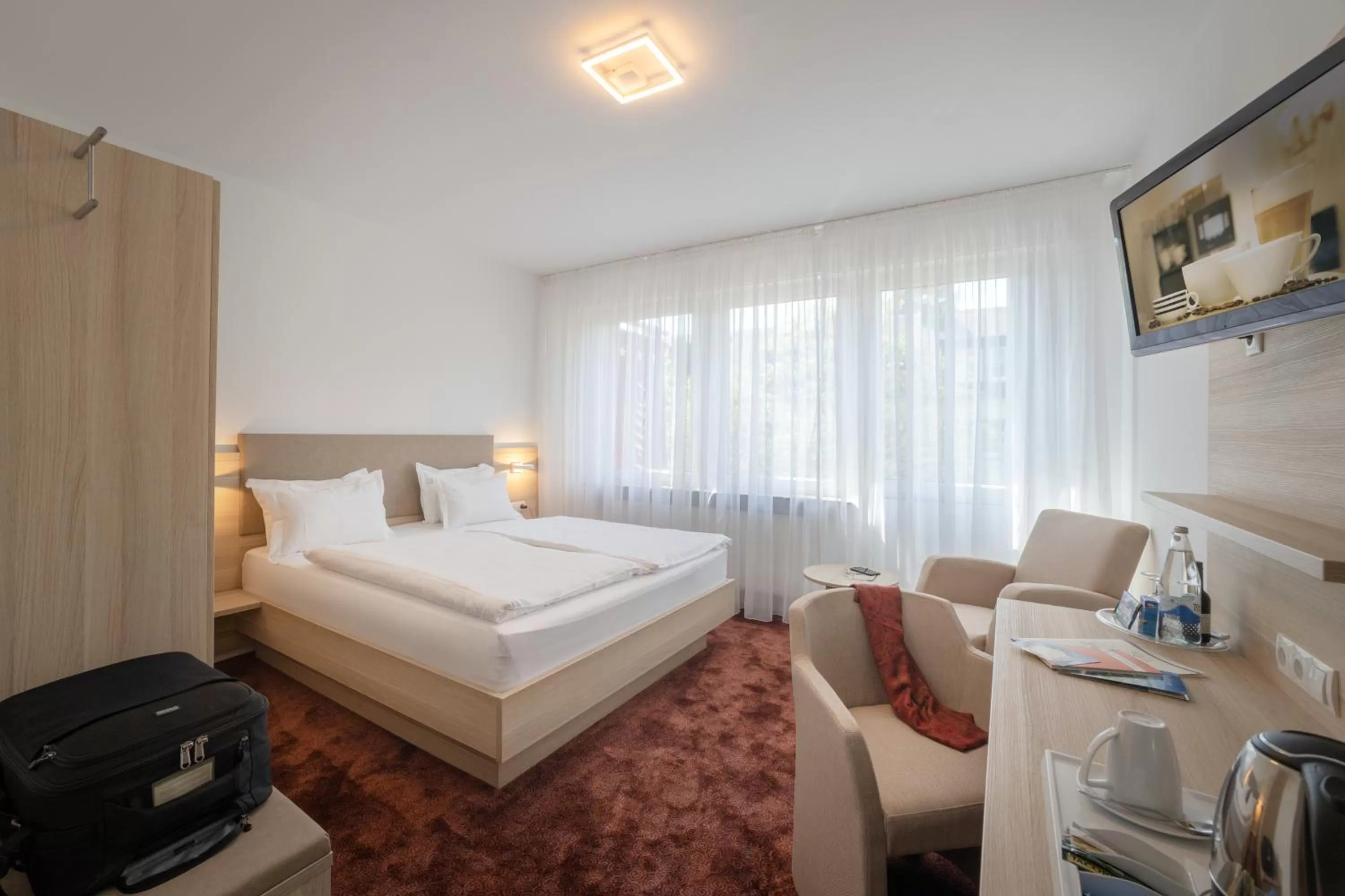 Bed in Hotel Brenner