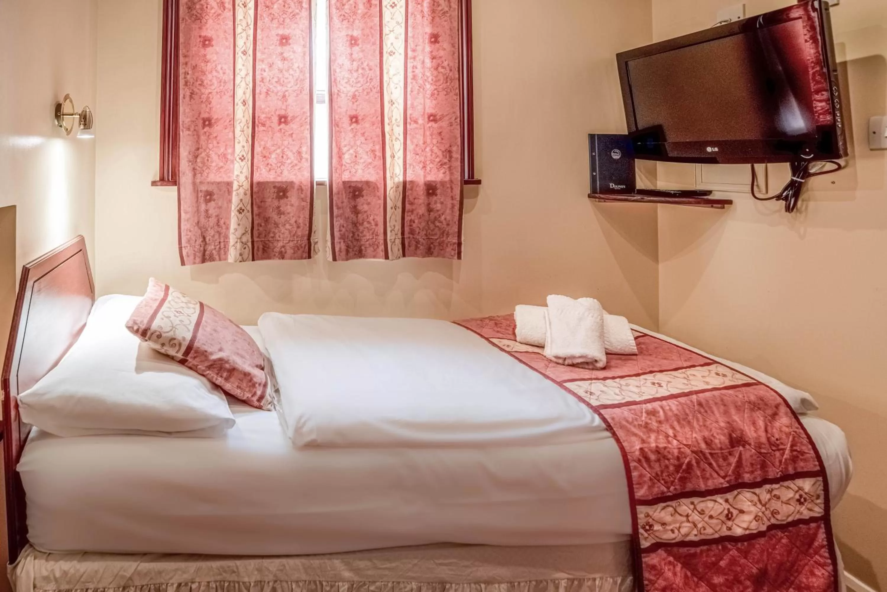 Bed in Dolphin Hotel