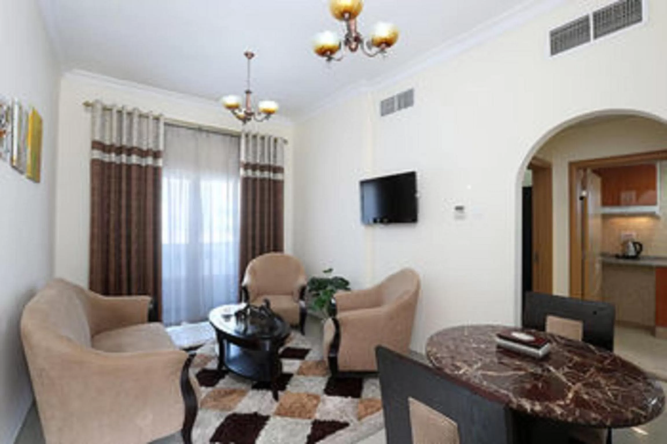 Living room in Al Smou Hotel Apartments - MAHA HOSPITALITY GROUP