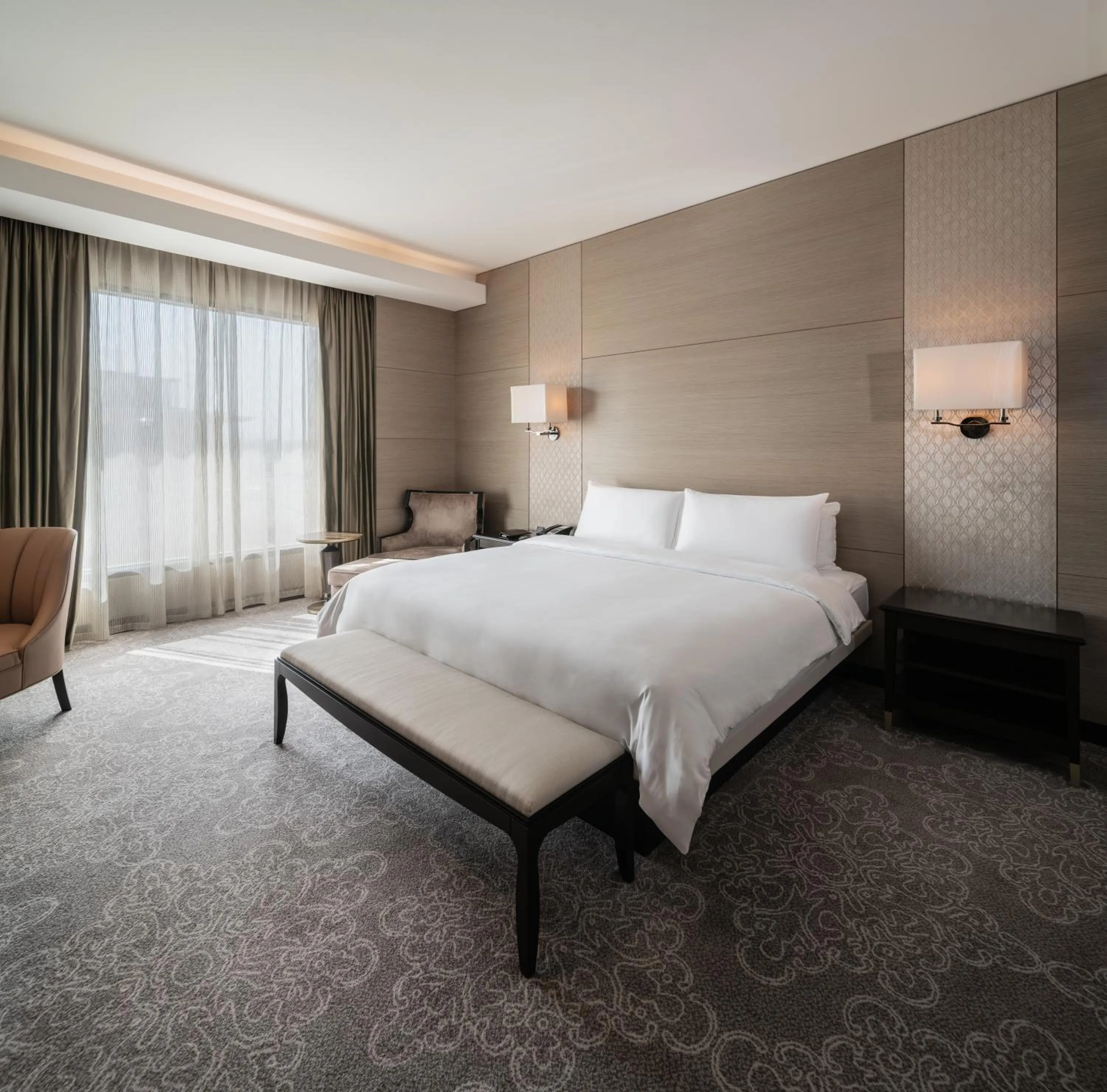 Bed in Radisson Collection Muscat, Hormuz Grand