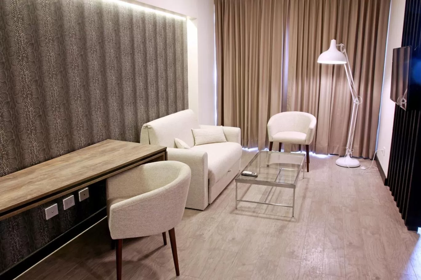 Living room in Urban Suites Apart Hotel