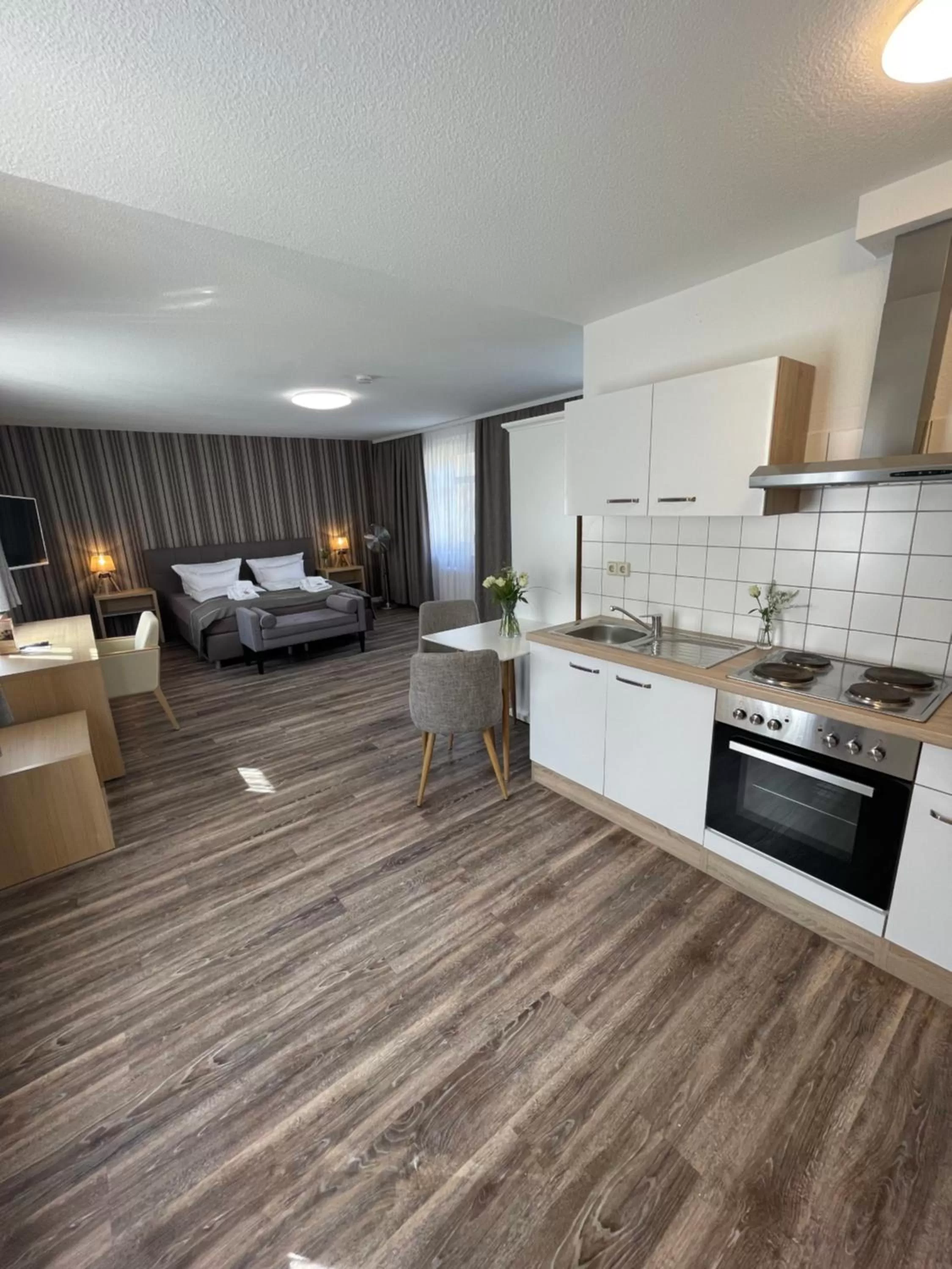 Bedroom in "Zur Altstadt - Am Fuße der Osterburg" Gaststätte, Pension, FEWO