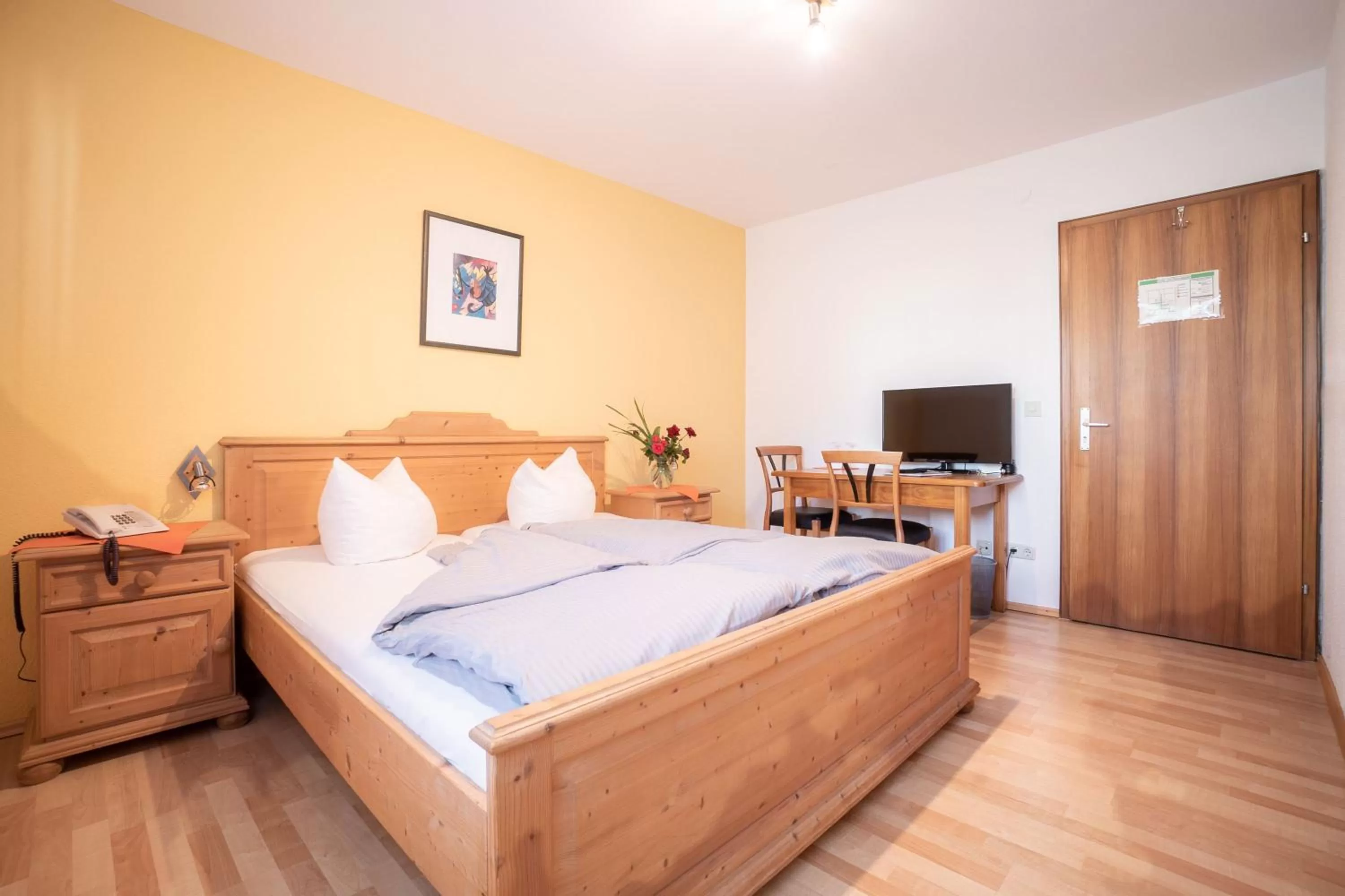 Bed in Landhotel Weißer Hahn