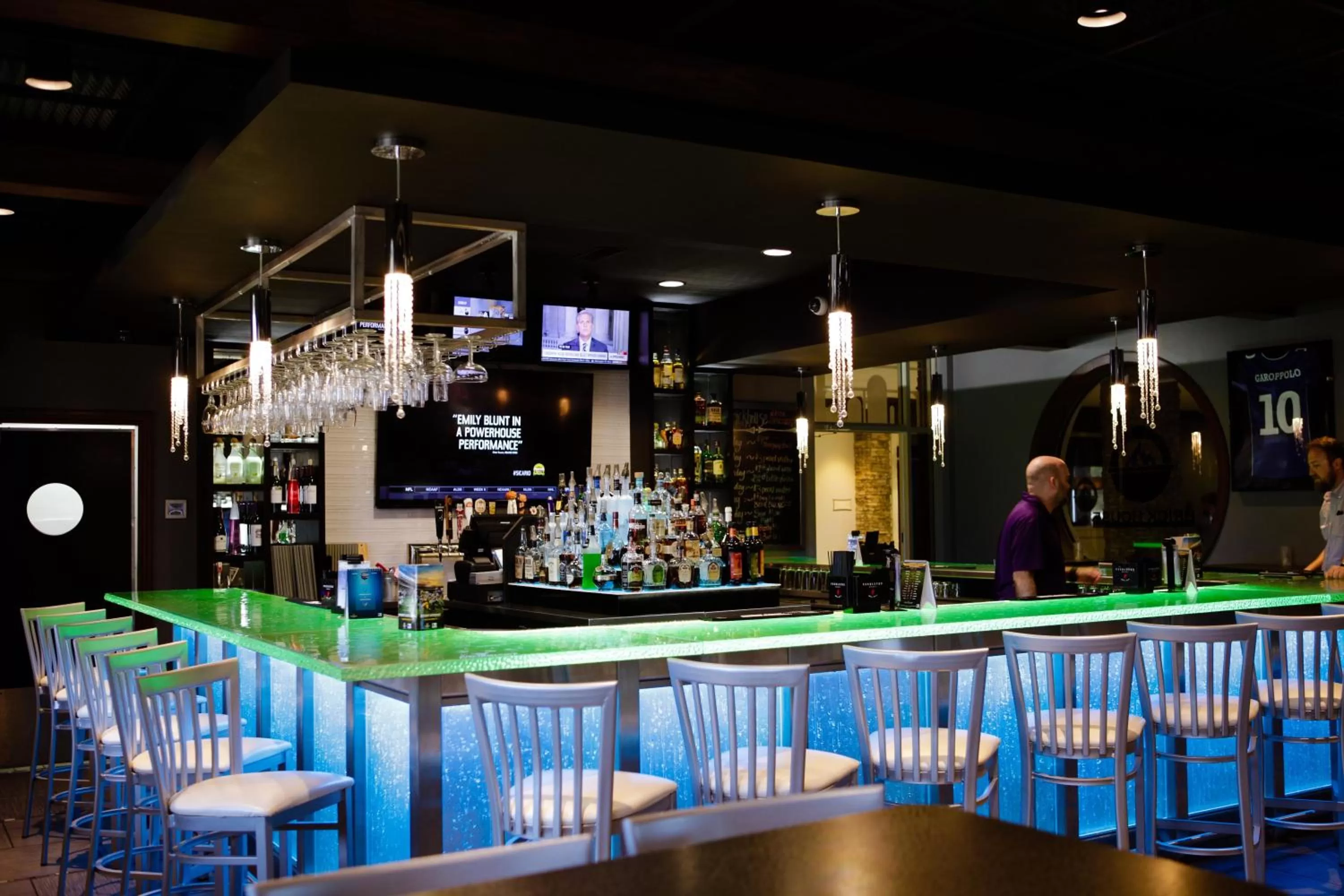 Lounge or bar in Unique Suites Hotel