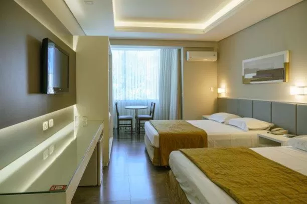 Photo of the whole room, Bed in Rafain Palace Hotel & Convention Center