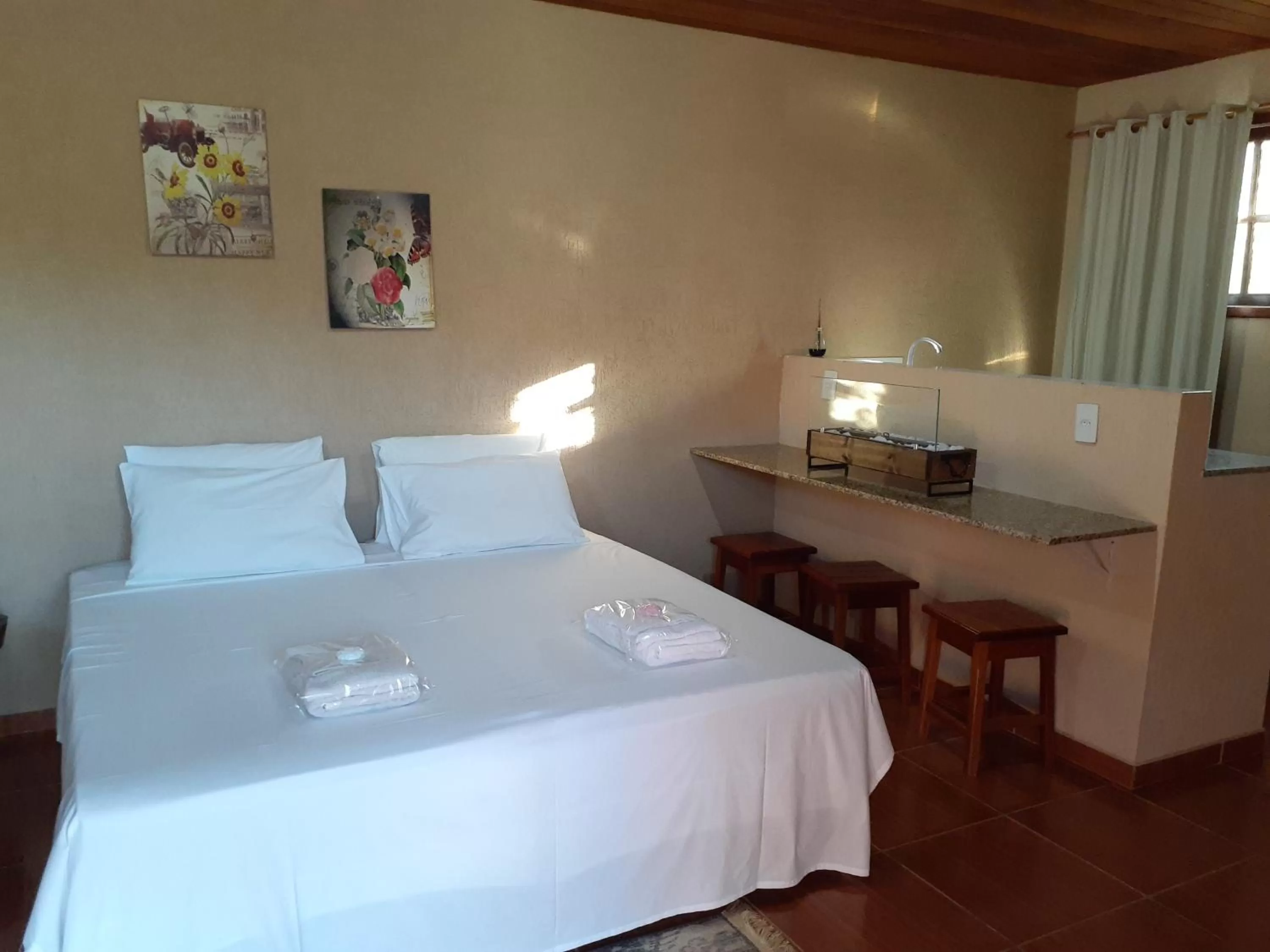 Bed in Pousada R.N.C. Nosso Paraíso