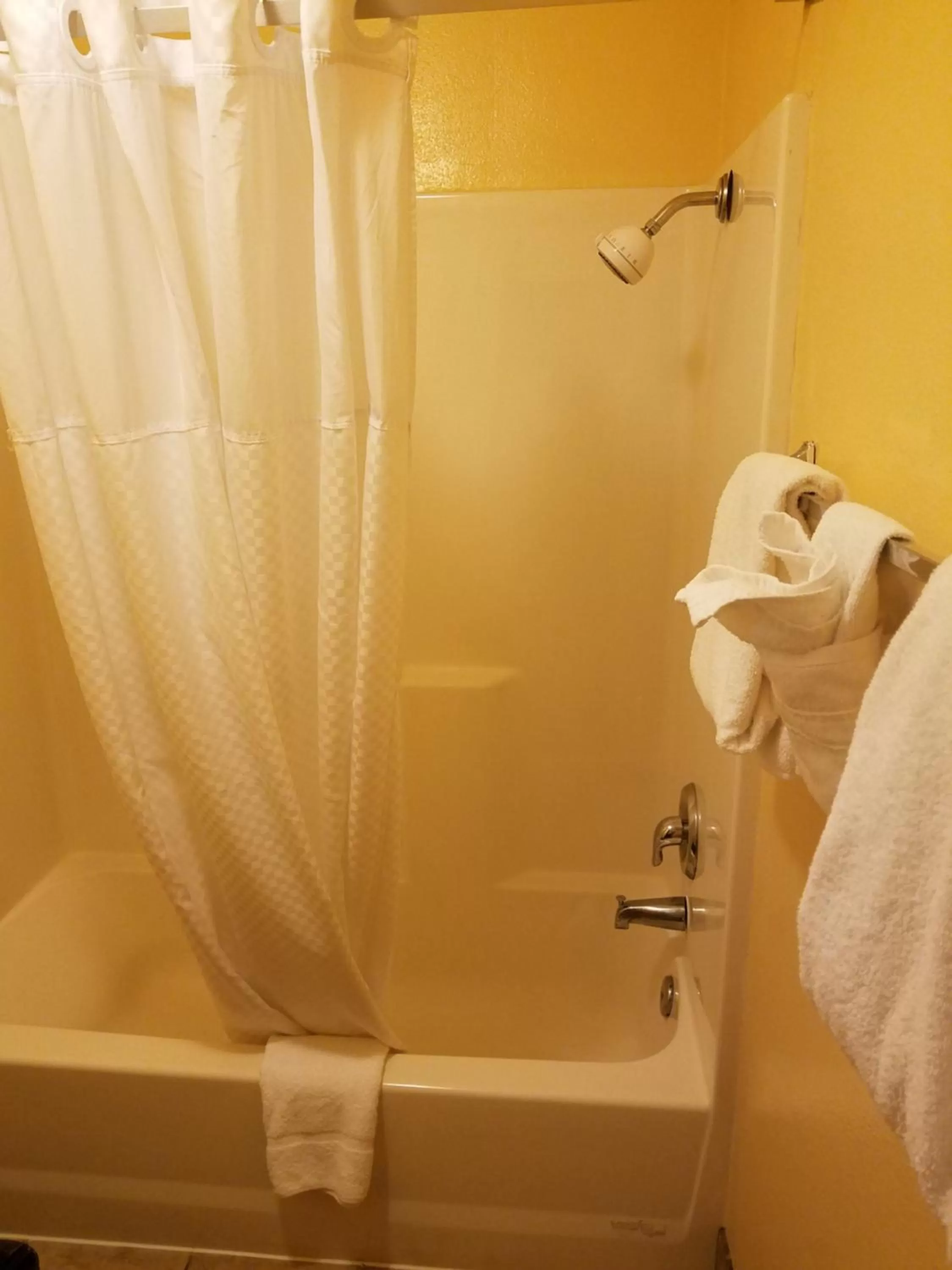 Shower in Travelodge by Wyndham Wenatchee