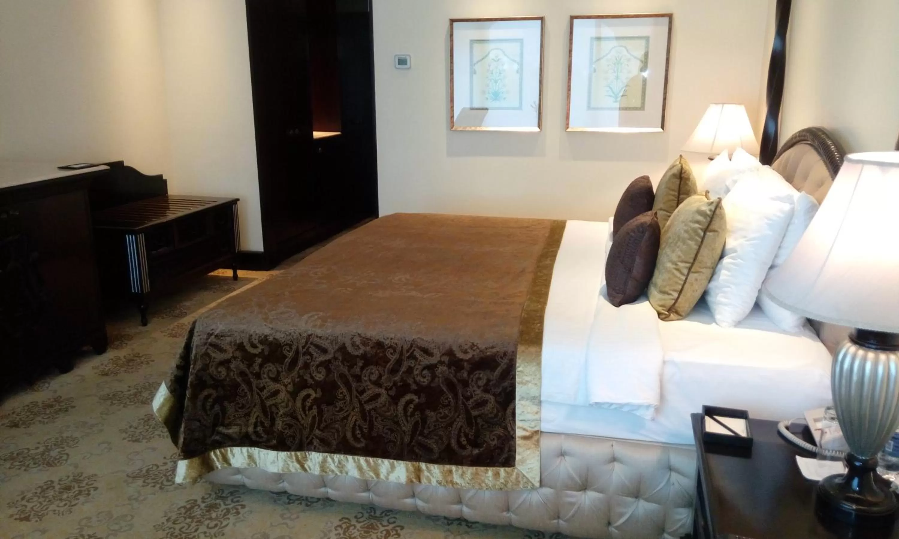 Photo of the whole room, Bed in Taj Krishna