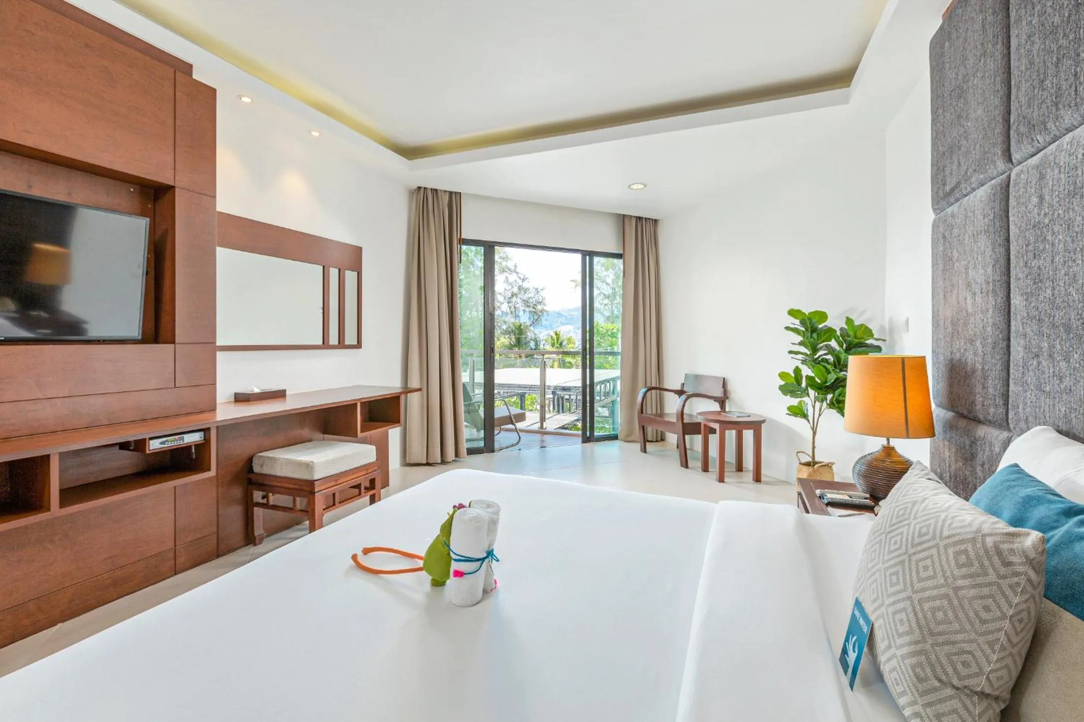 Bedroom in Baan Laimai Beach Resort & Spa - SHA Extra Plus