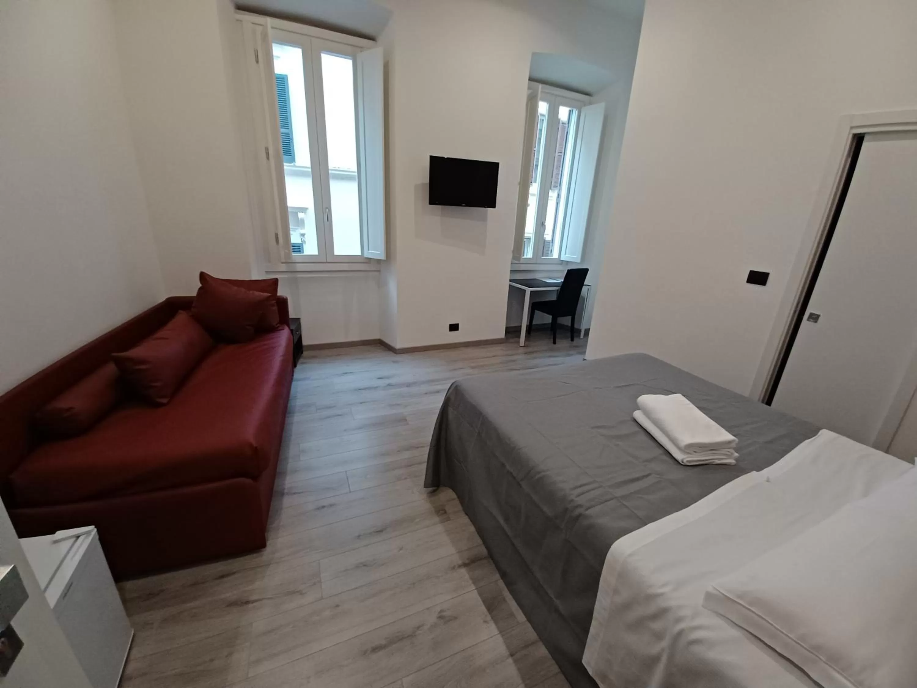 Bed in Hotel Mimosa Pantheon