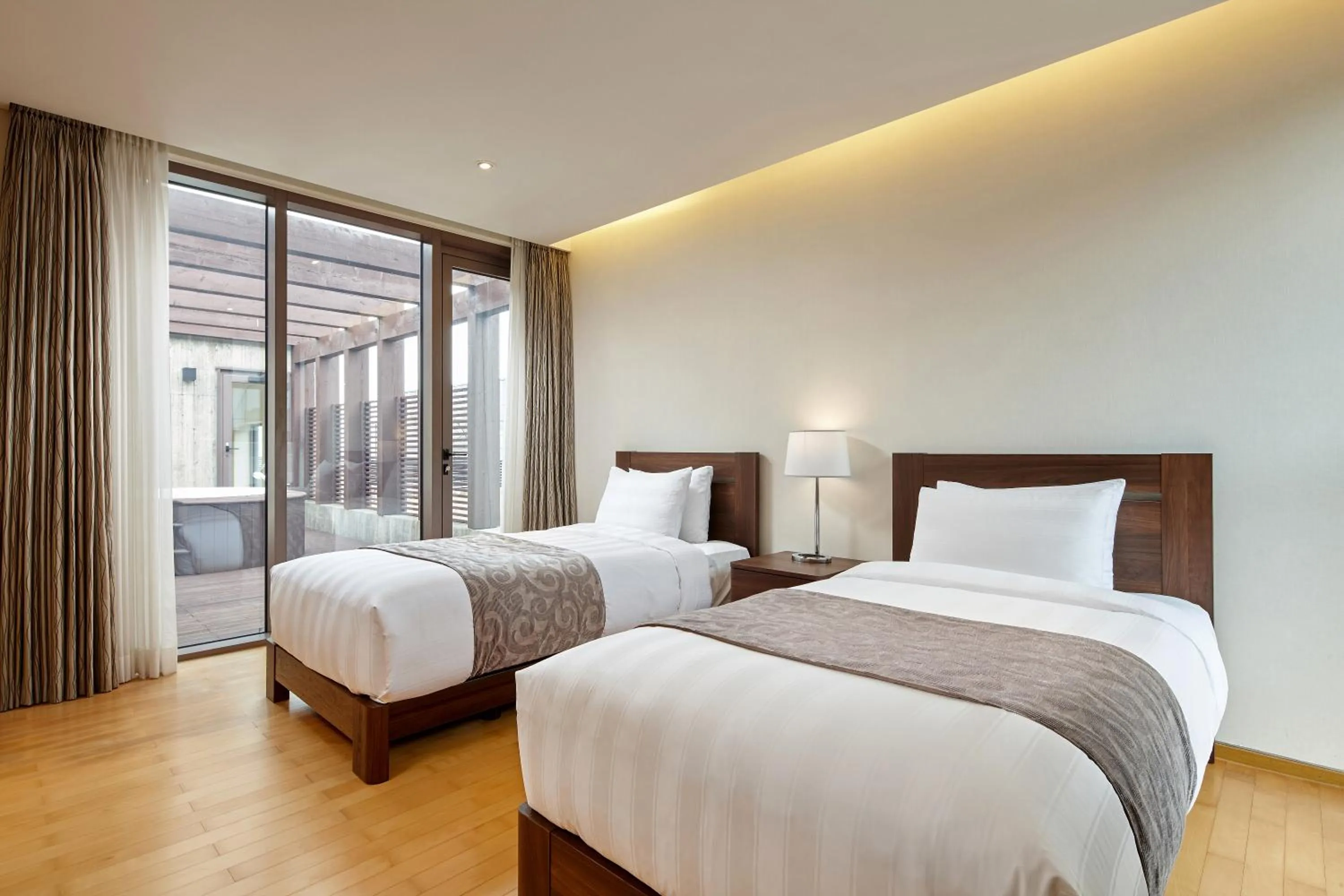 Area and facilities, Bed in Lotte Resort Jeju Artvillas