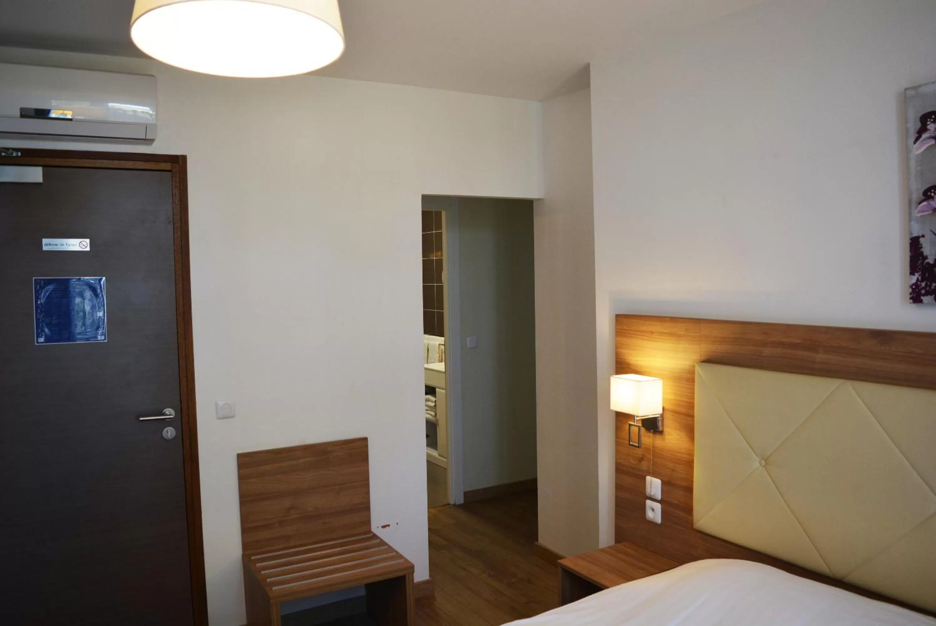 Bed in Le Grand Hôtel Molière