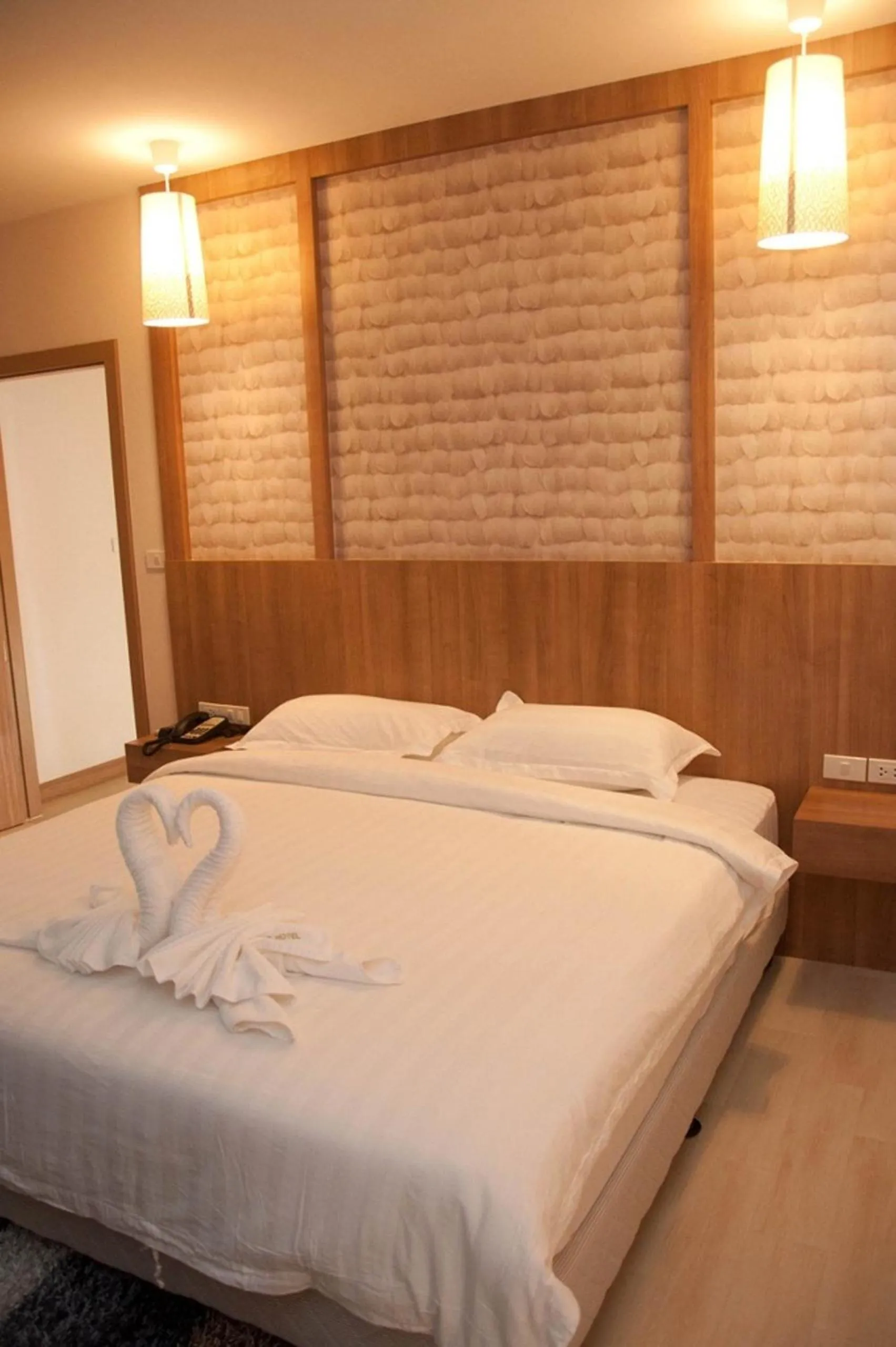 Bed in Golden City Rayong Hotel