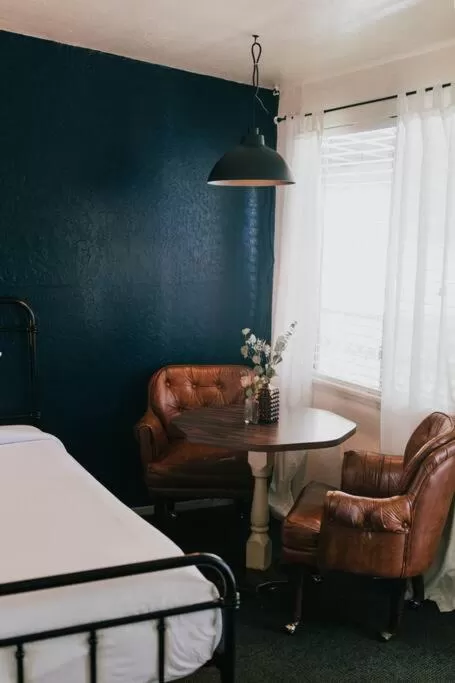Seating area, Bed in The Long Barn Lodge