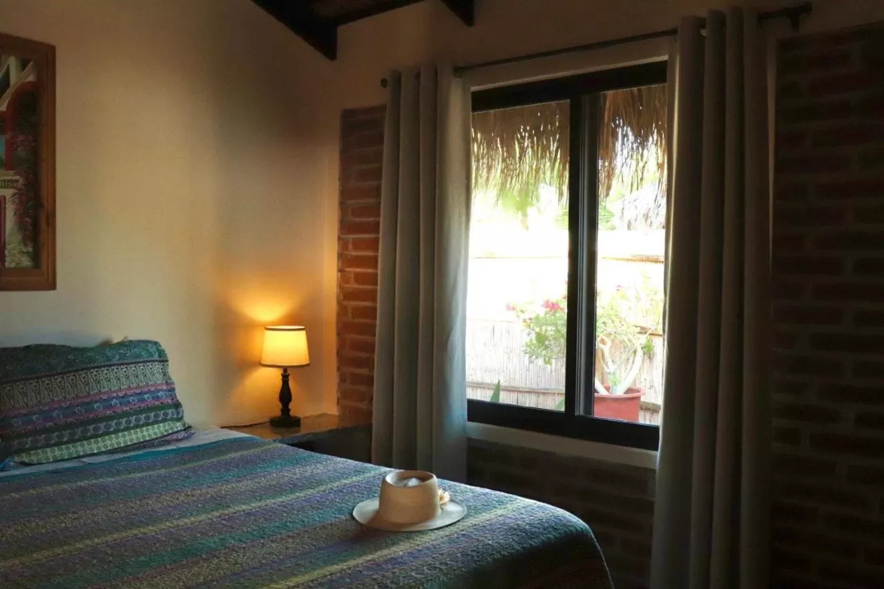 Bed in Sukasa Bungalows
