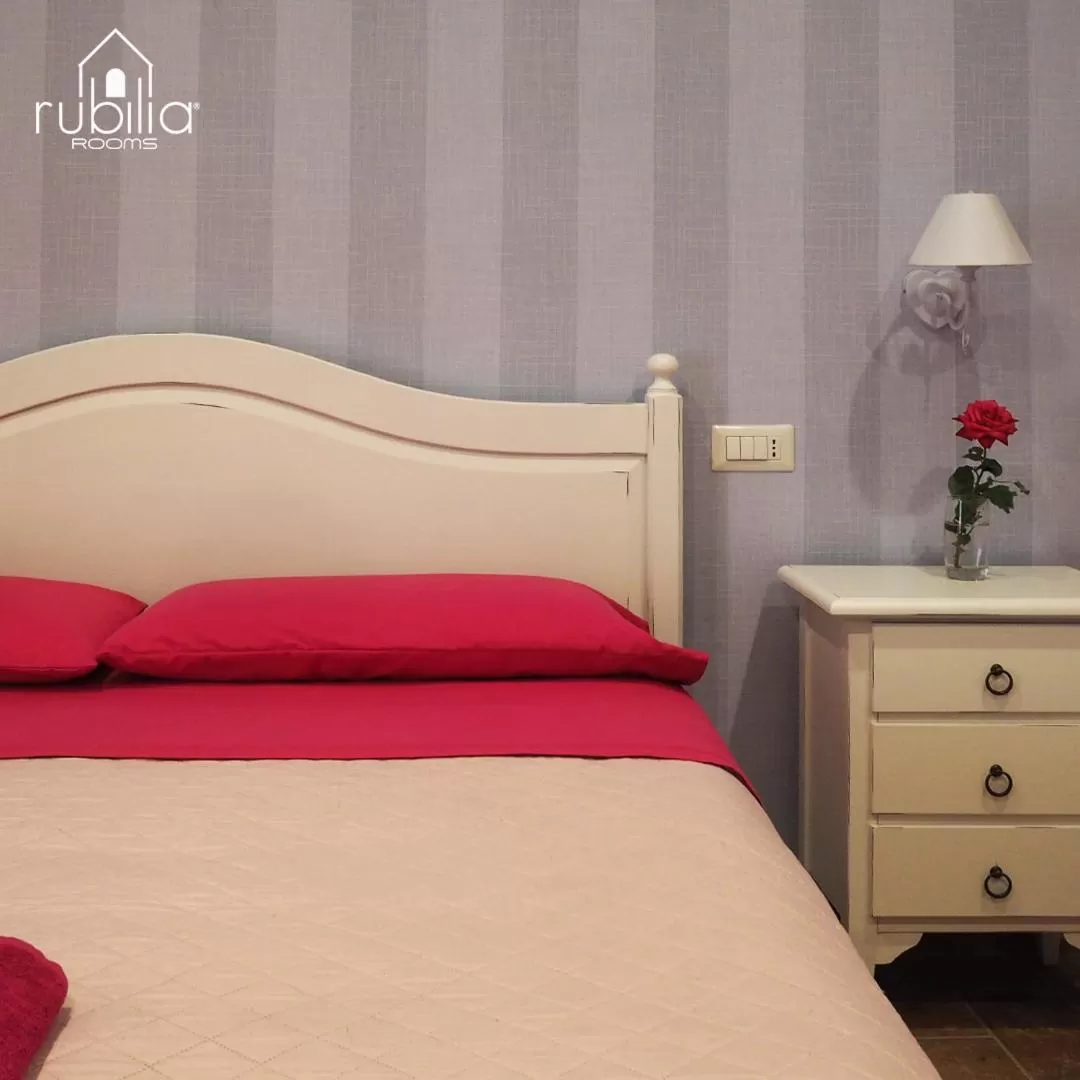 Bed in Rubilia Rooms Pompei