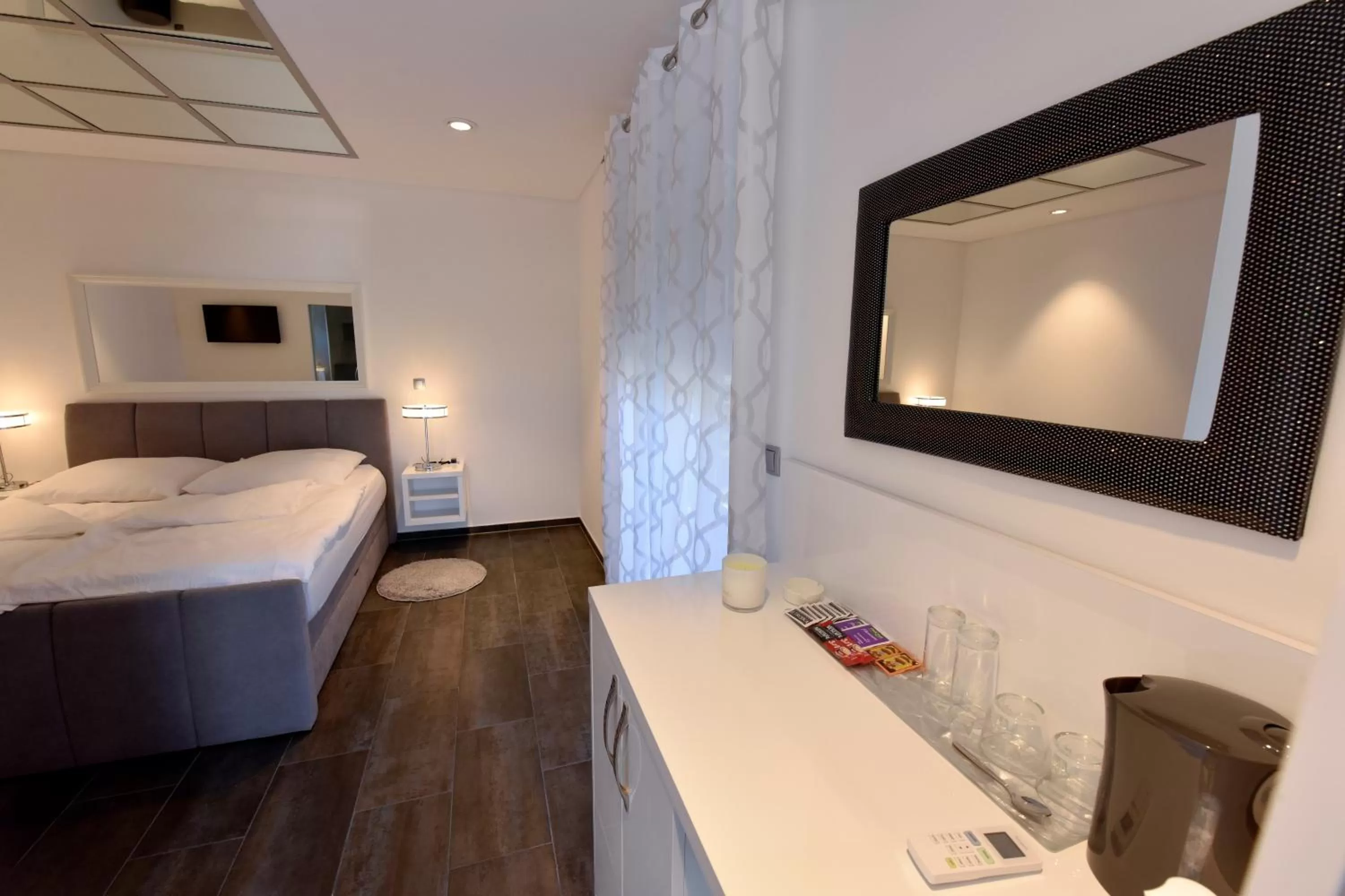 Bed, Bathroom in Apartmani i Bungalovi TROJKA