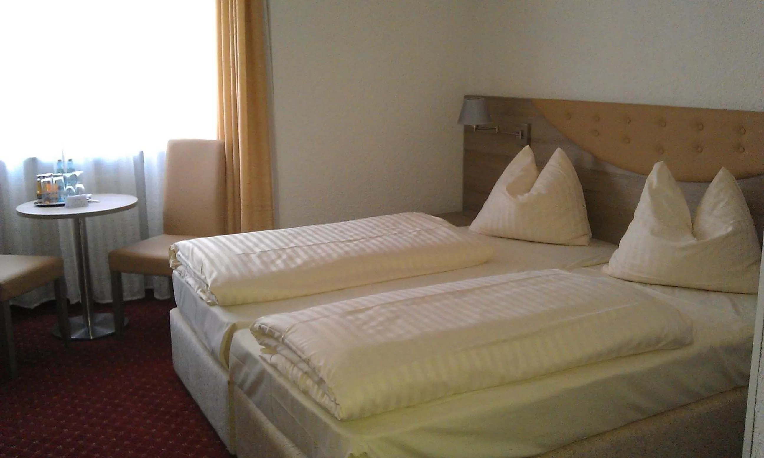 Bed in Airport Hotel Filder Post