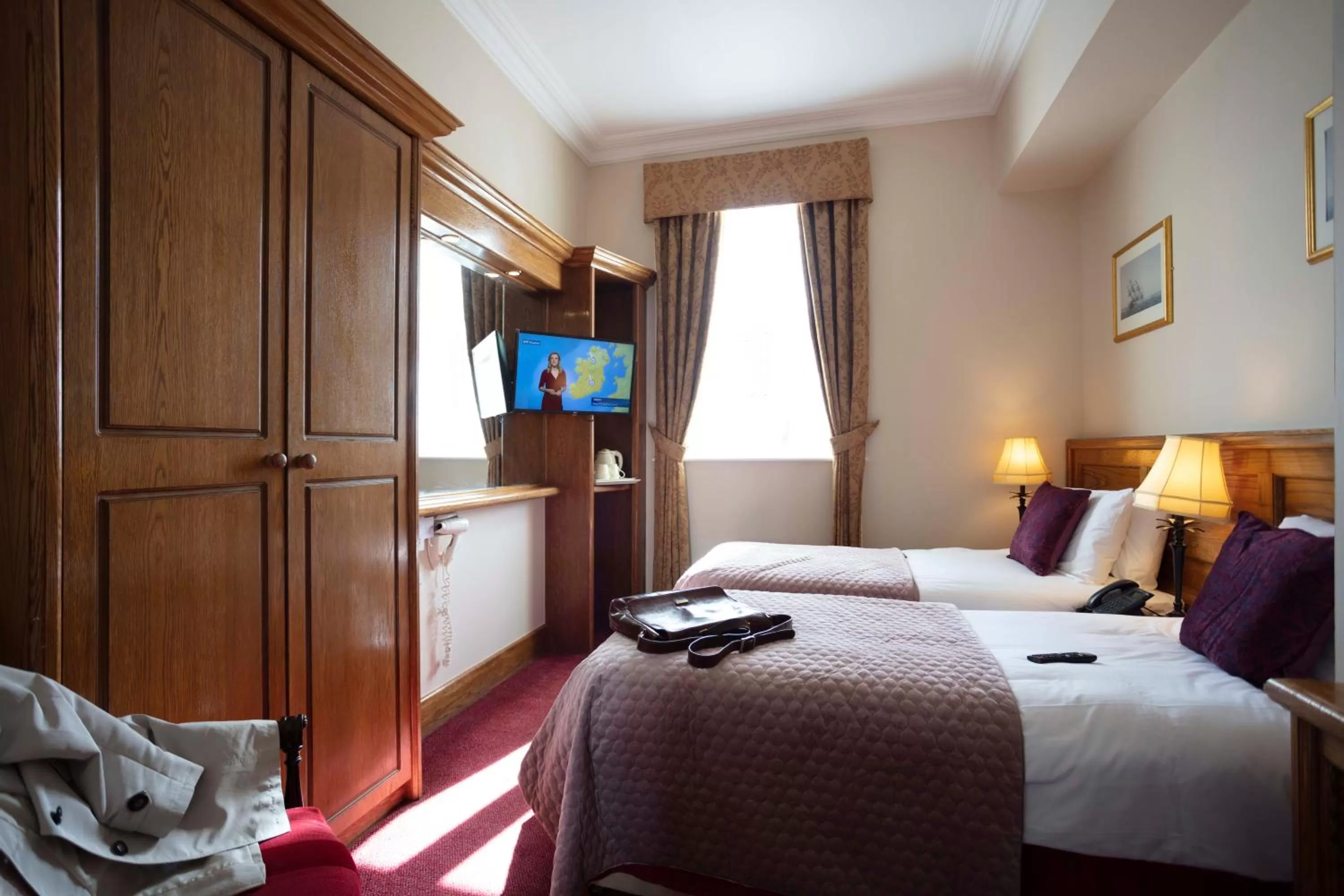 Bed in Scholars Townhouse Hotel