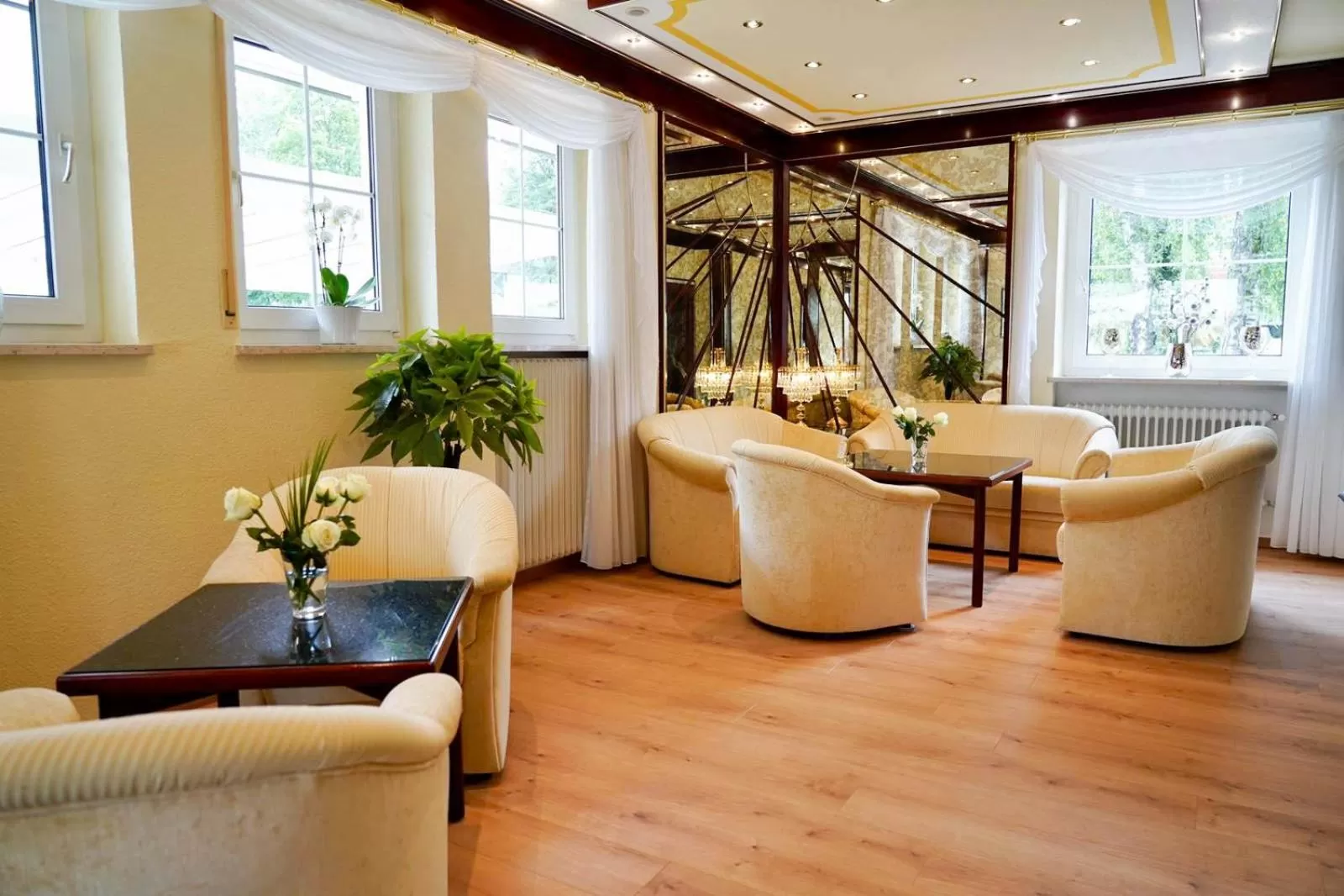 Communal lounge/ TV room in Kurhotel Wiedenmann