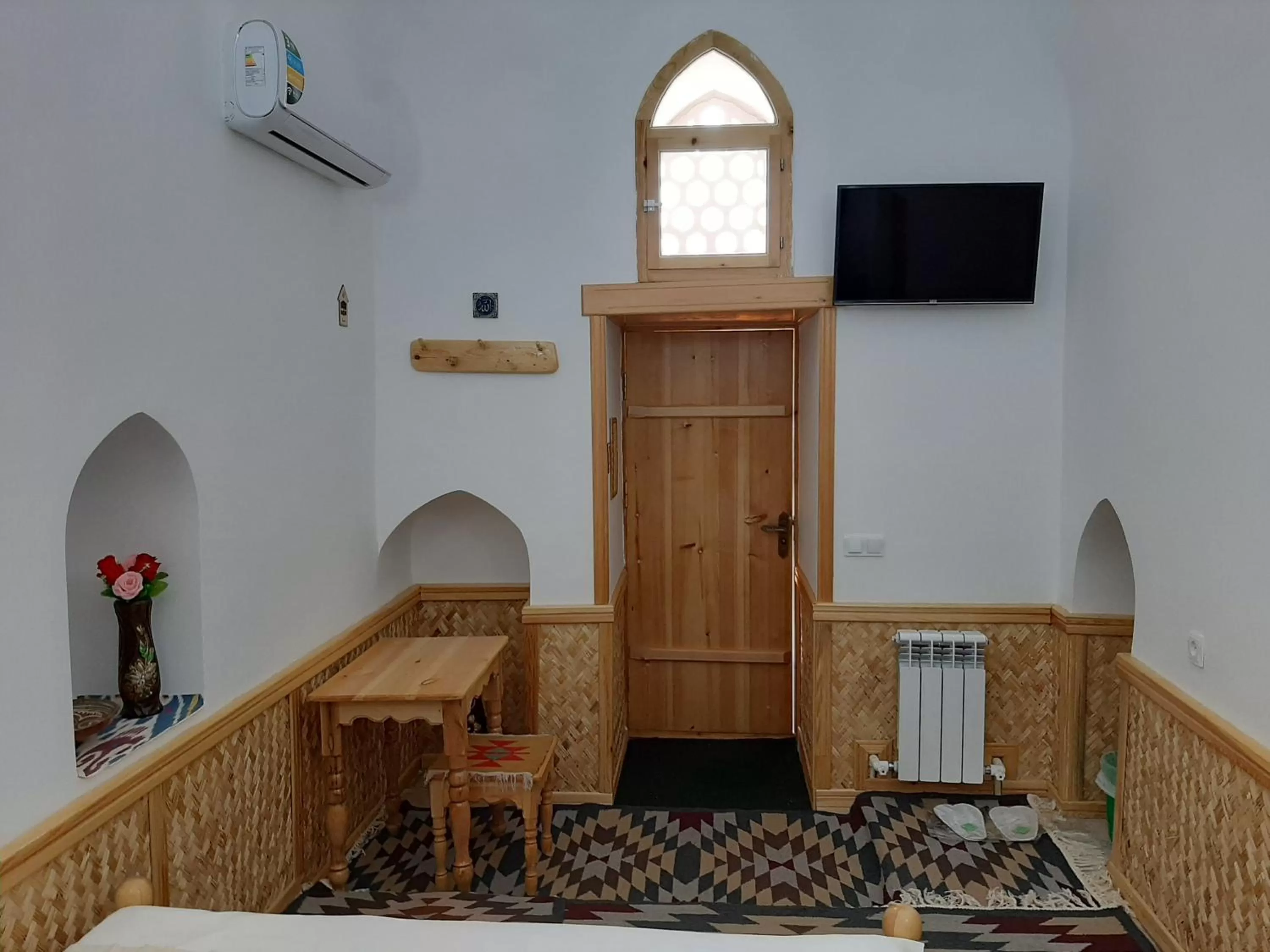 Photo of the whole room, TV/Entertainment Center in madrasah Polvon-Qori boutique hotel