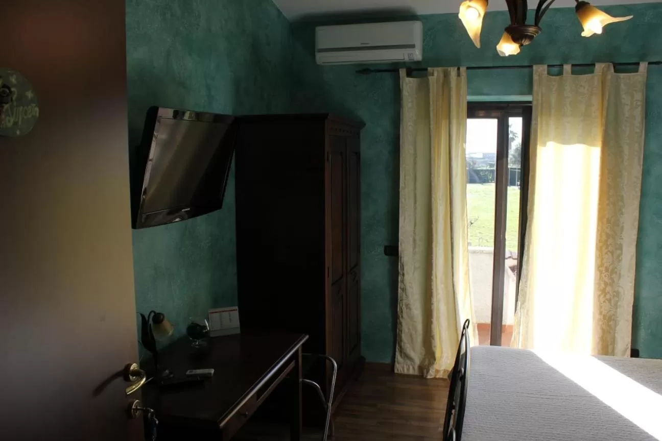 TV/Entertainment Center in Relais Maria Luisa Locazione turistica di Simona Capaccio